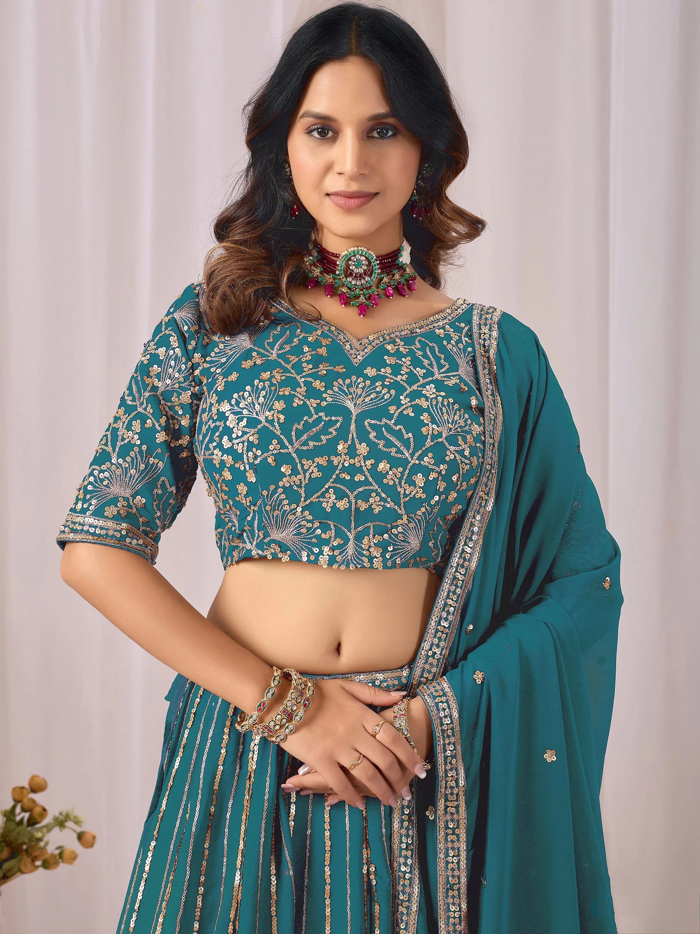 Amazing Teal Blue Embroidered Georgette Sangeet Wear Lehenga Choli