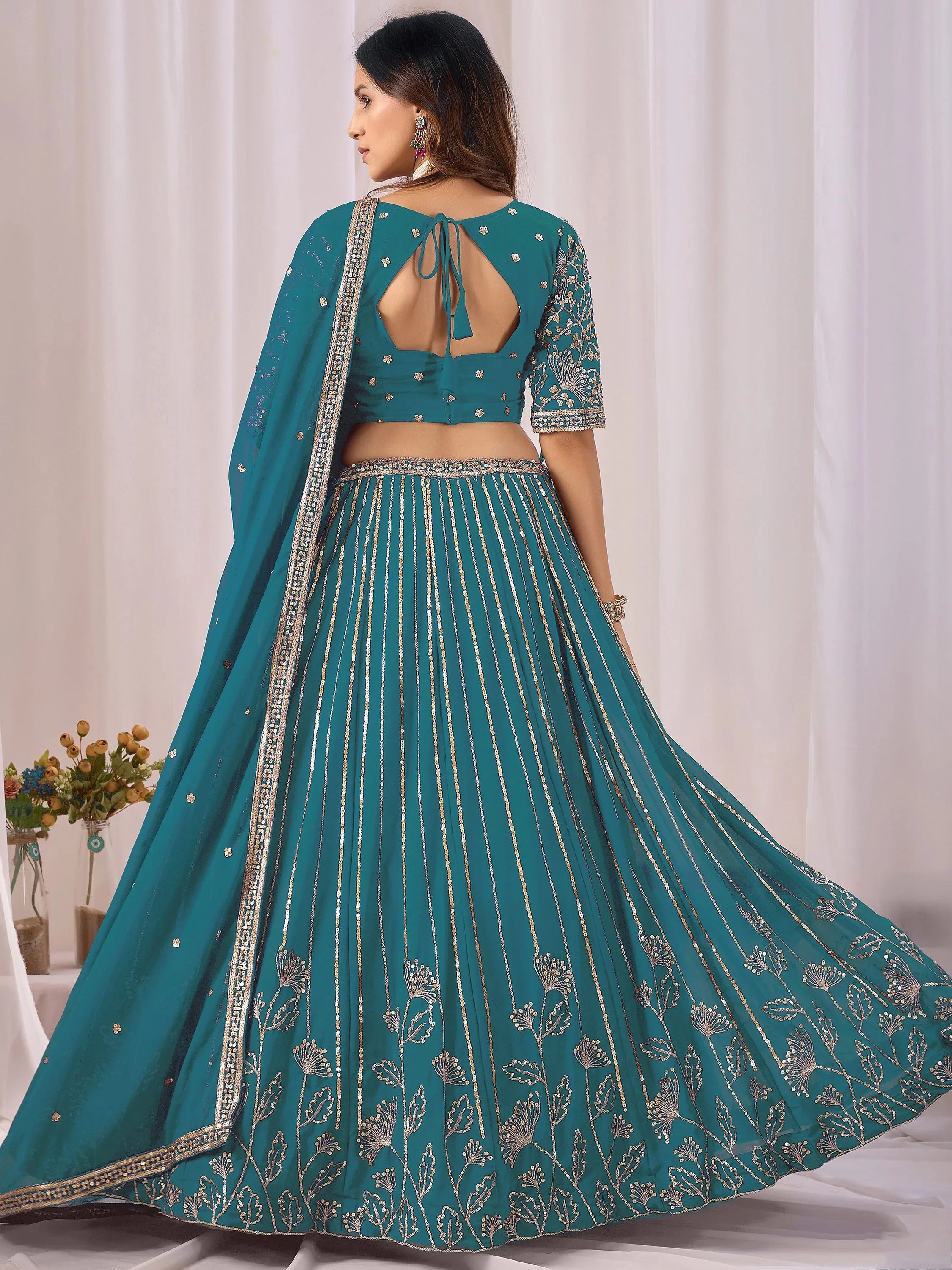 Amazing Teal Blue Embroidered Georgette Sangeet Wear Lehenga Choli