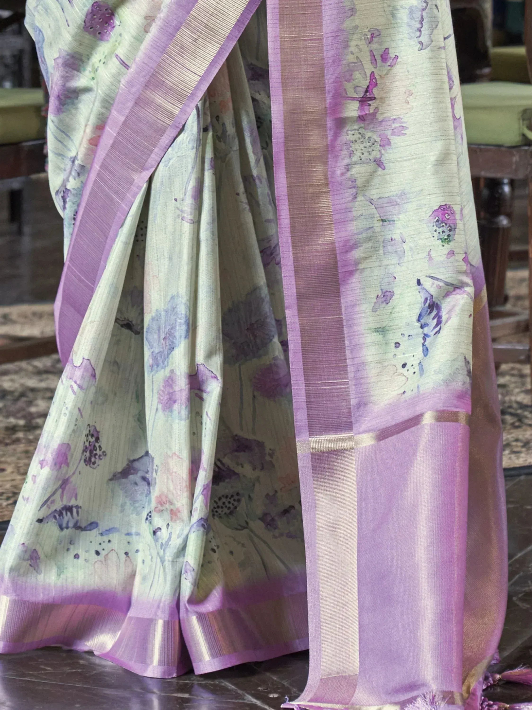 Light green saree with purple floral print and zari border, elegant Indian ethnic wear