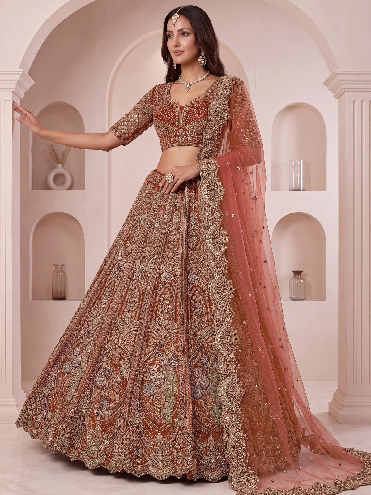 Regal Rust Pink Zircon Work Net Wedding Wear Lehenga With Blouse