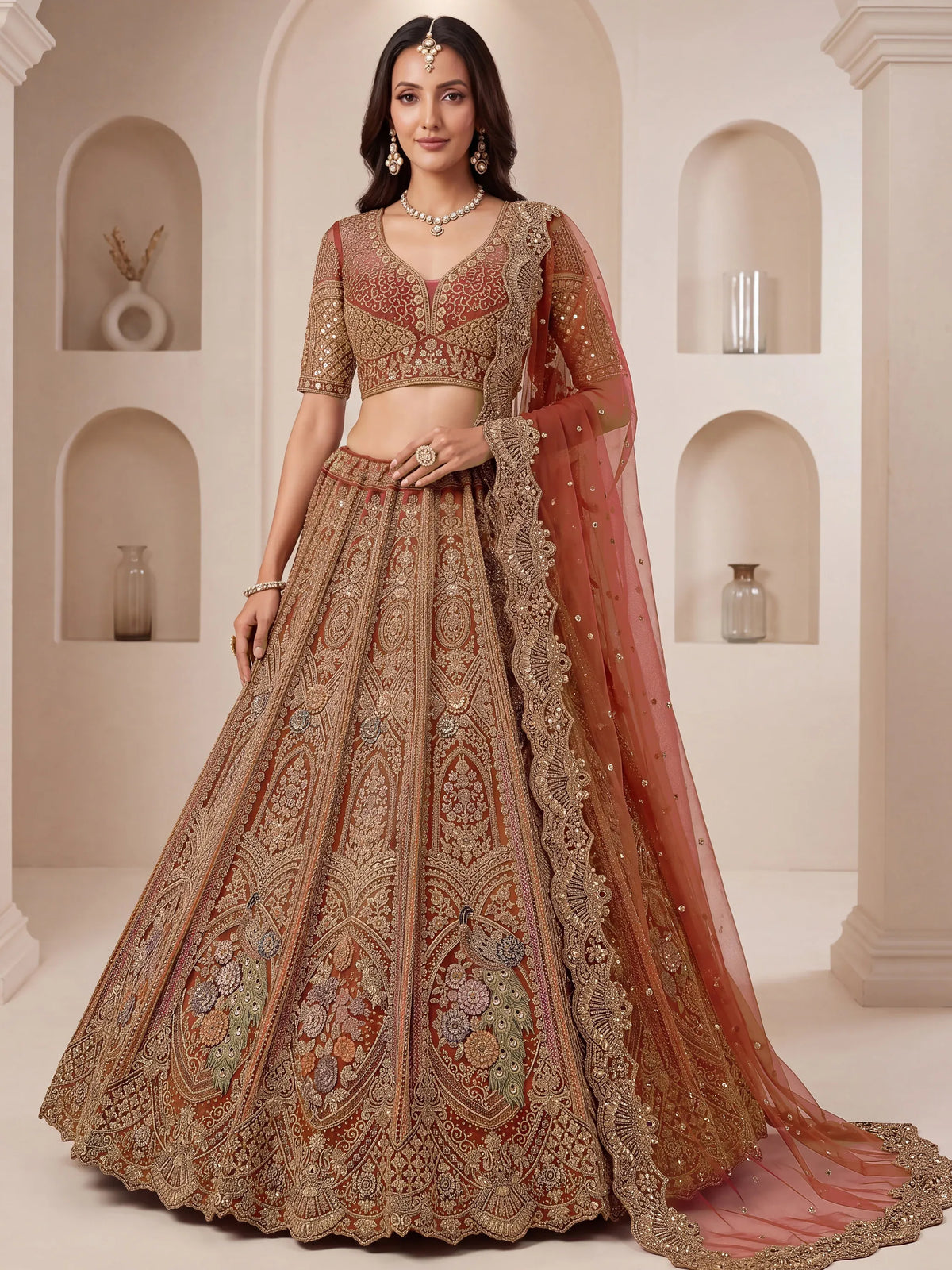 Regal Rust Pink Zircon Work Net Wedding Wear Lehenga With Blouse