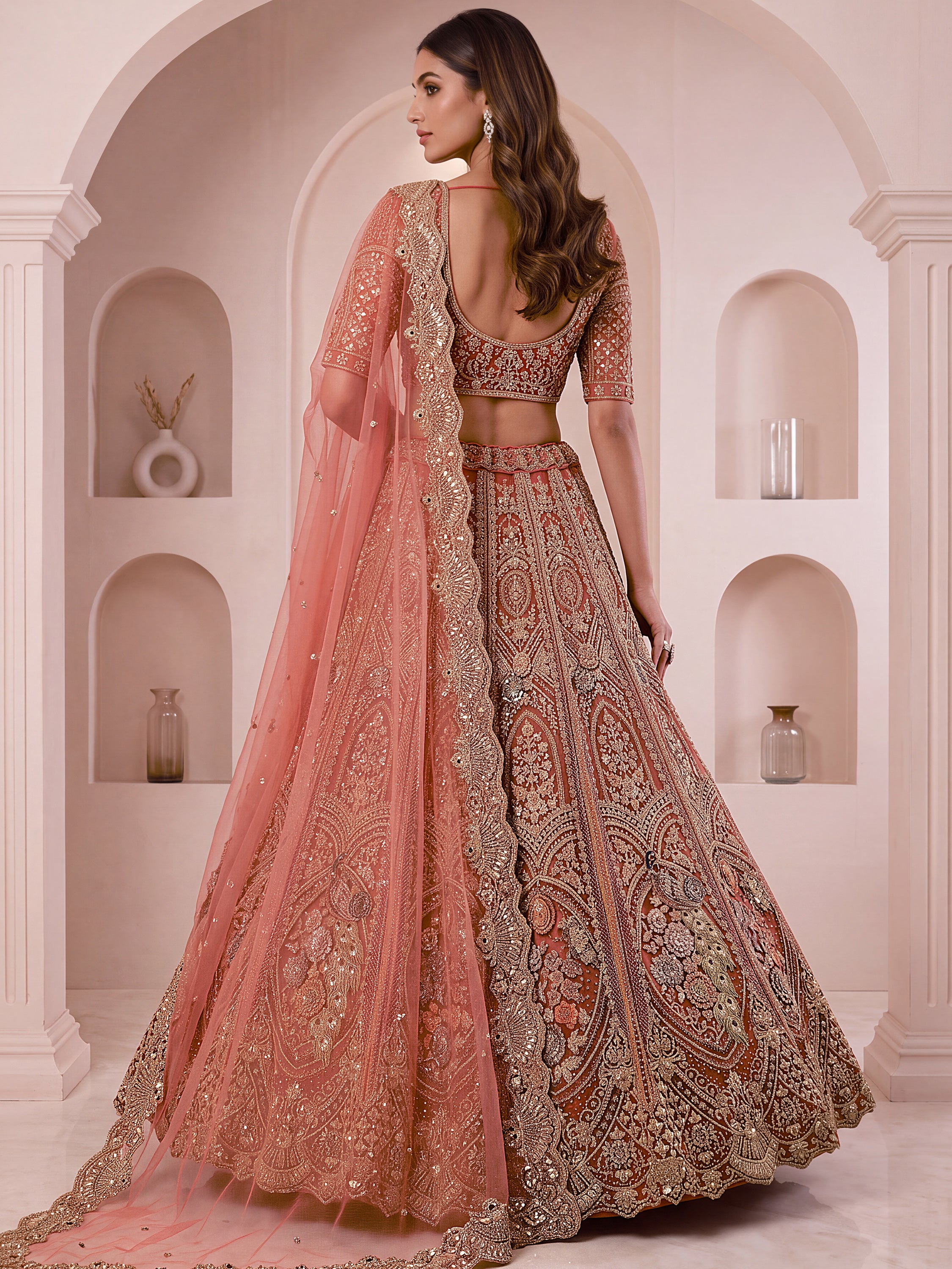 Regal Rust Pink Zircon Work Net Wedding Wear Lehenga With Blouse