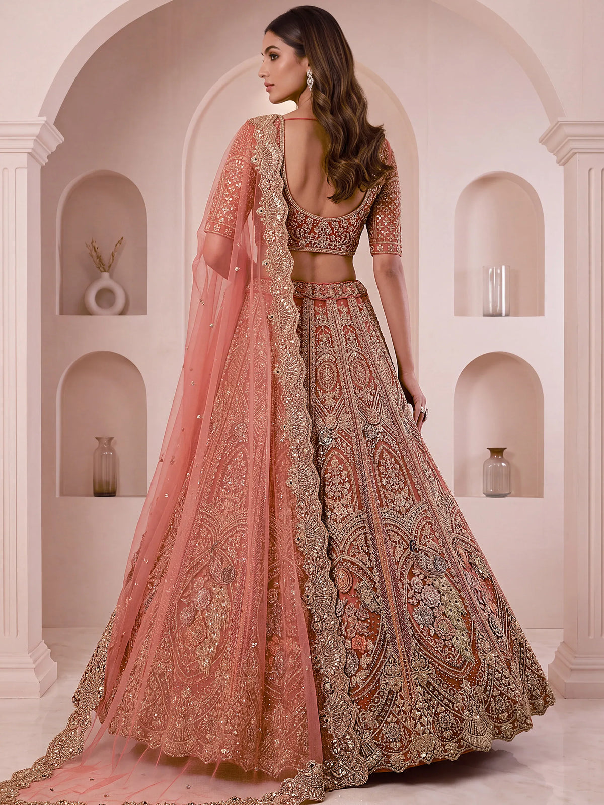 Regal Rust Pink Zircon Work Net Wedding Wear Lehenga With Blouse