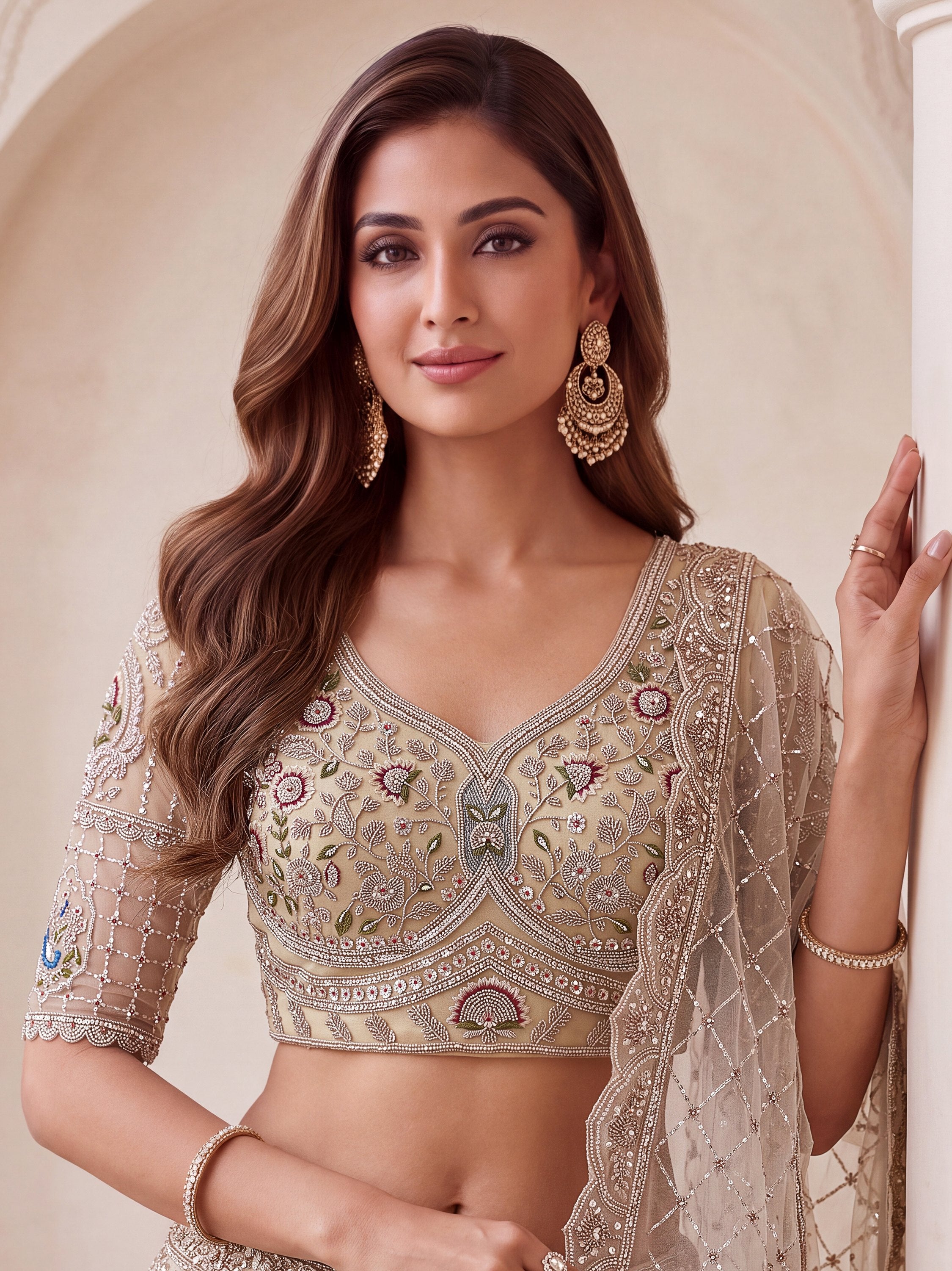 Noteworthy Beige Zari Work Net Sangeet Wear Lehenga Choli With Dupatta