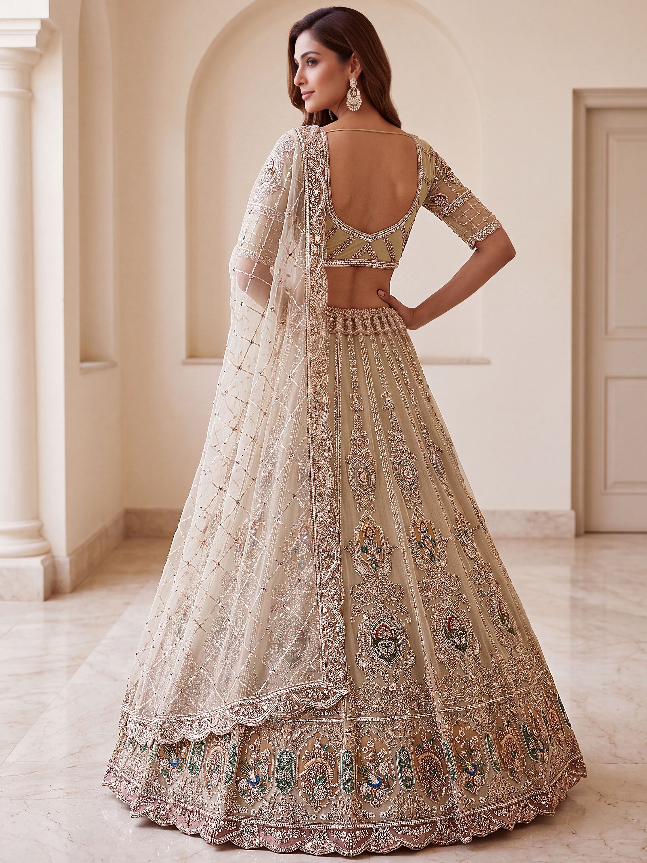 Noteworthy Beige Zari Work Net Sangeet Wear Lehenga Choli With Dupatta