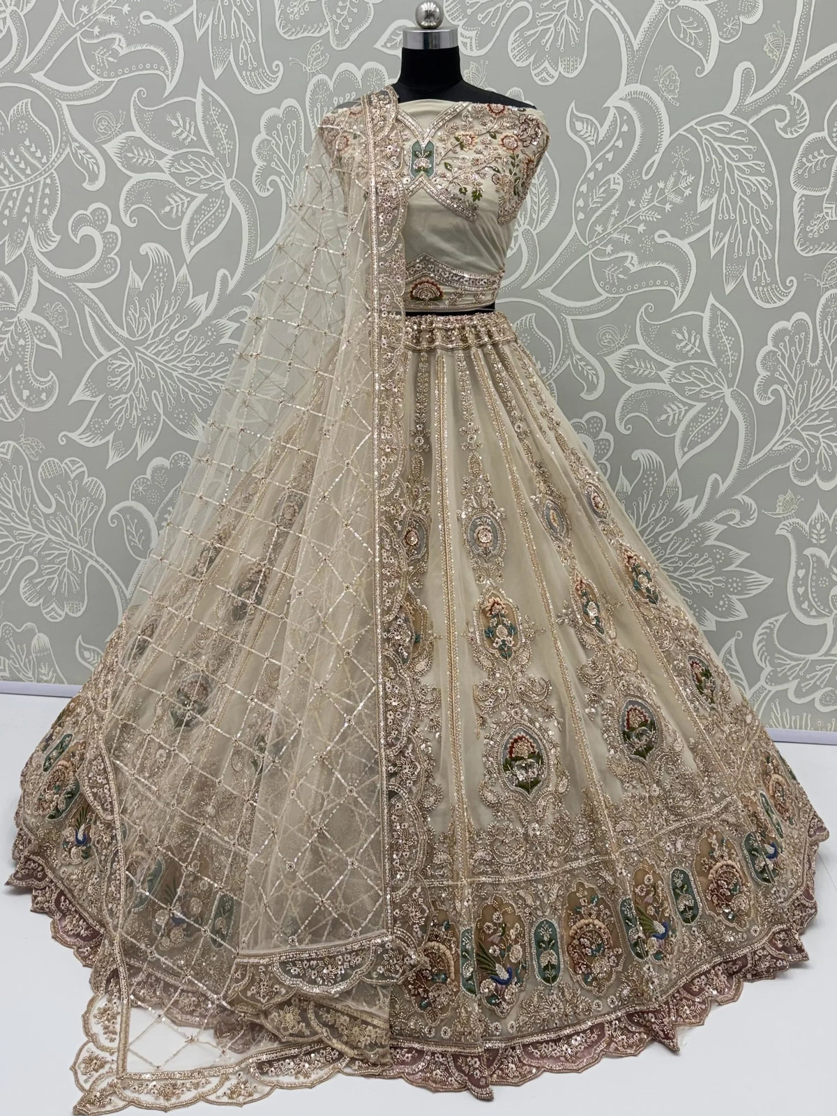 Noteworthy Beige Zari Work Net Sangeet Wear Lehenga Choli With Dupatta