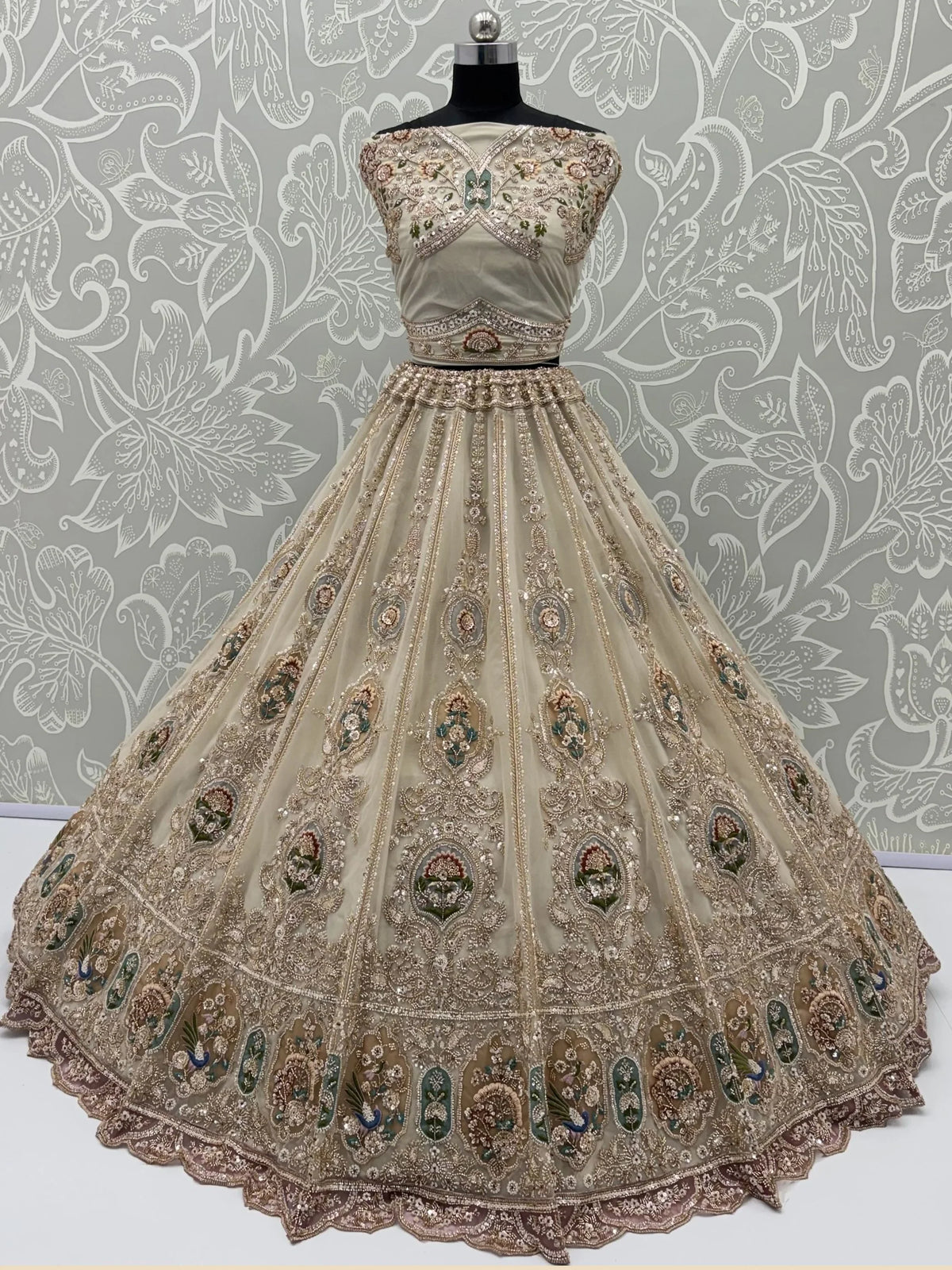 Noteworthy Beige Zari Work Net Sangeet Wear Lehenga Choli With Dupatta