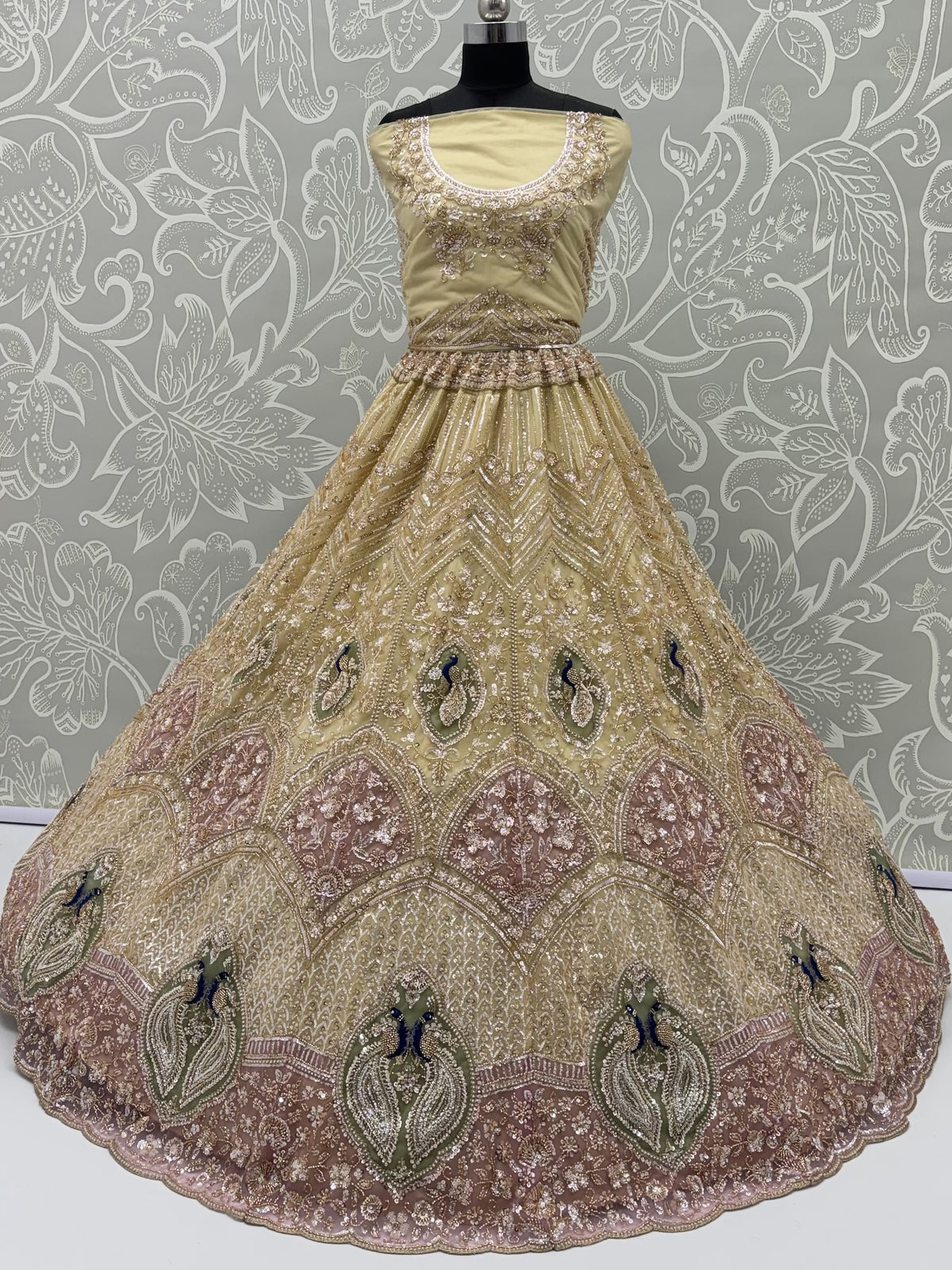 Gorgeous Golden Bead Embroidered Net Sangeet Wear Lehenga Choli