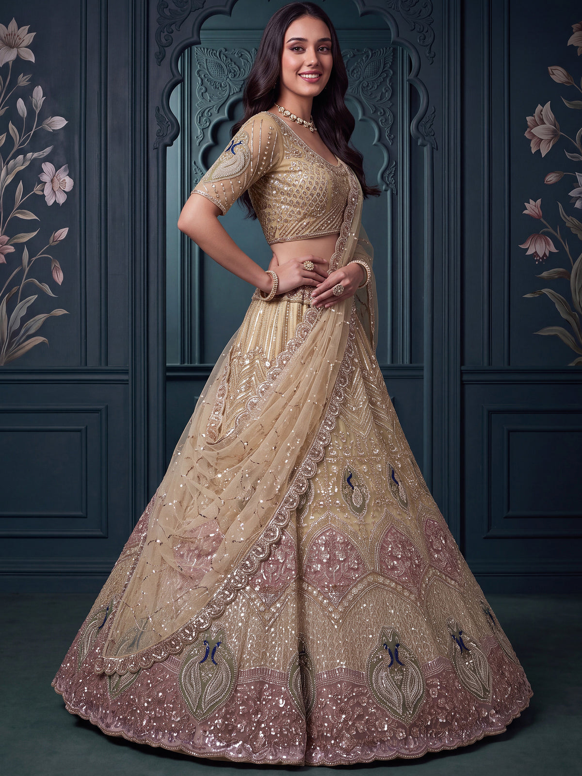 Gorgeous Golden Bead Embroidered Net Sangeet Wear Lehenga Choli