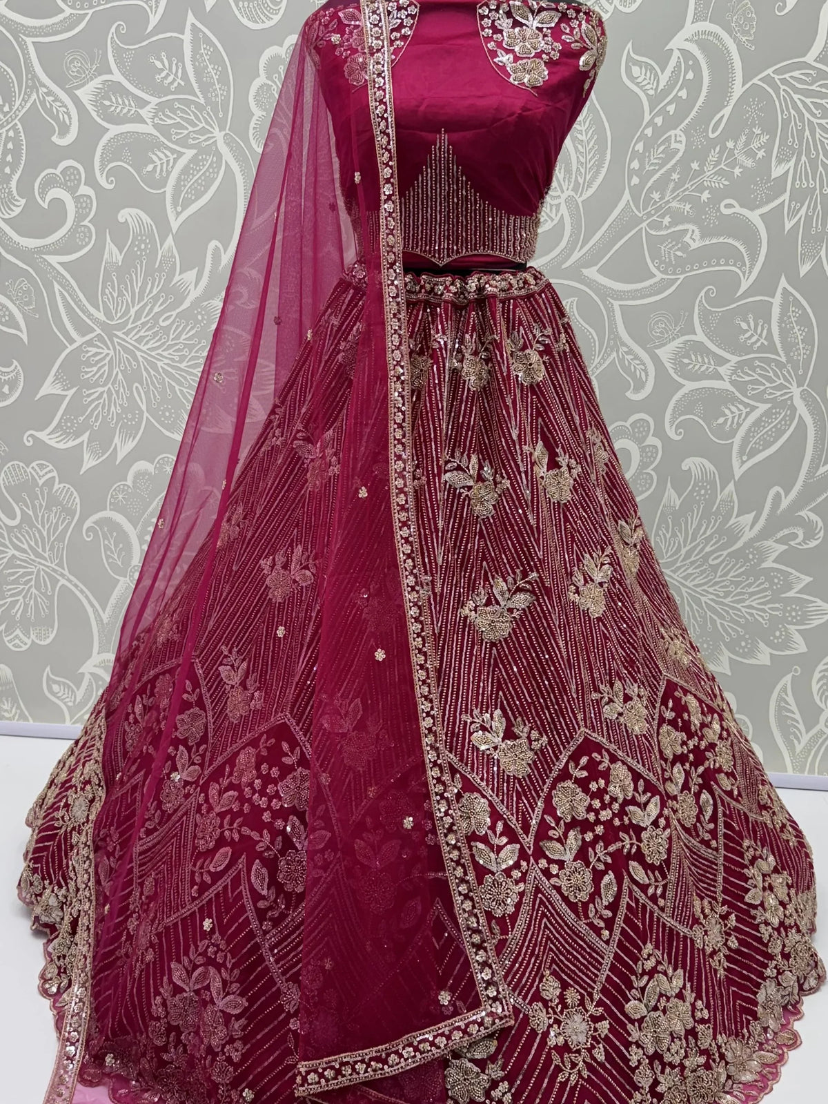 Captivating Rani Pink Thread Work Net Engagement Wear Lehenga Choli