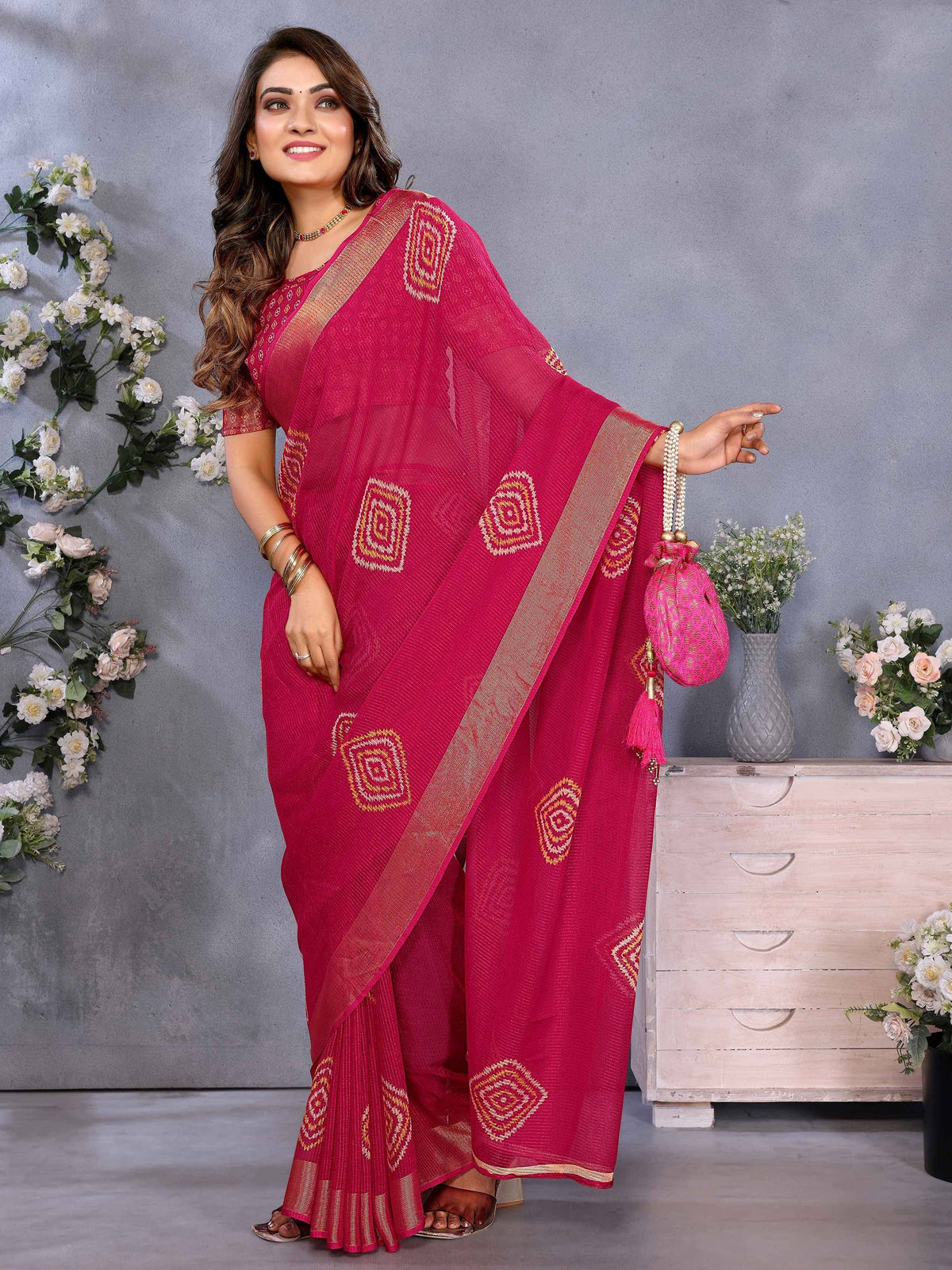 Pink ethnic saree with gold geometric print, perfect for Indian occasions and festivals