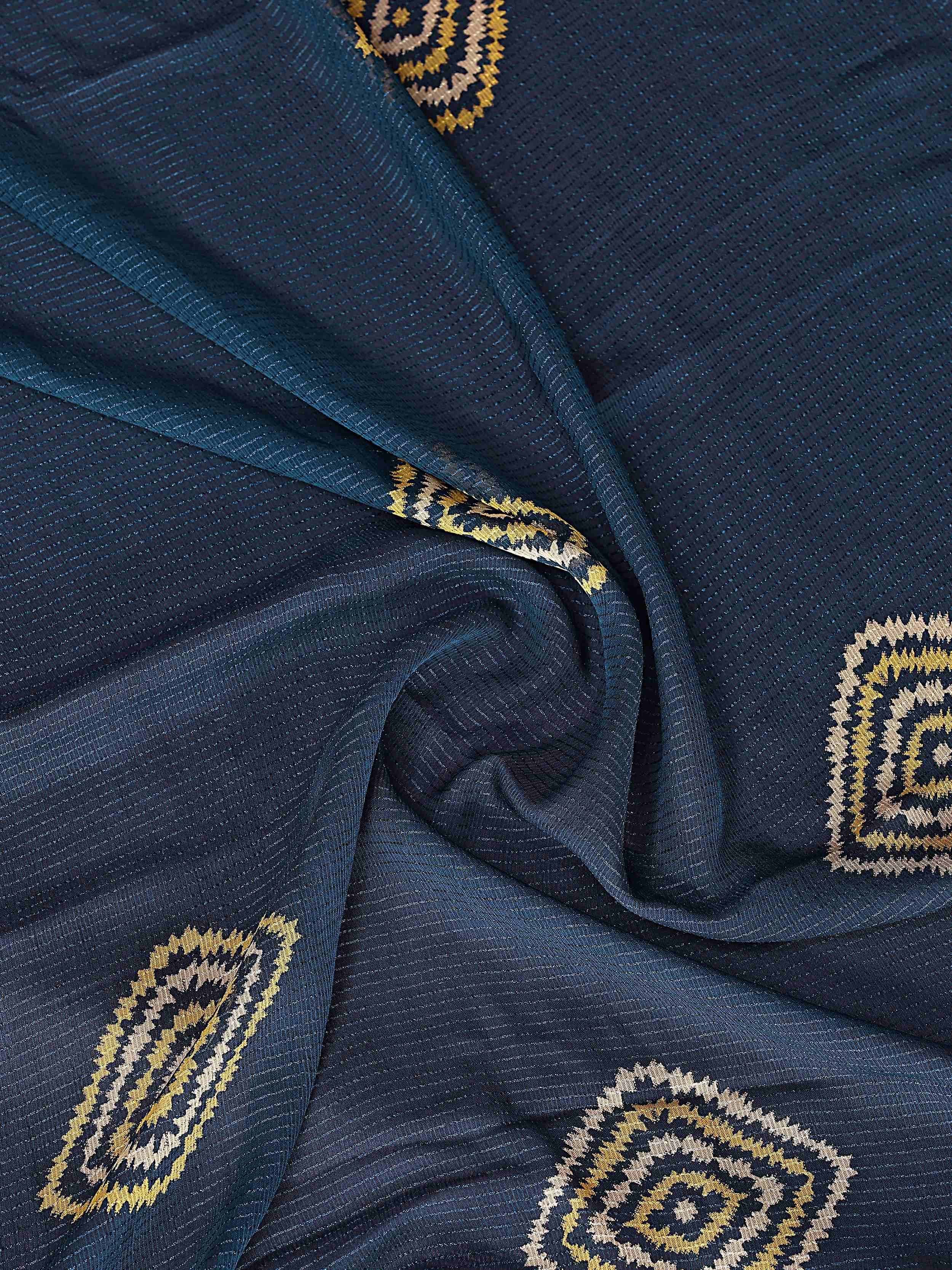 Navy blue ethnic saree with gold and beige woven motifs, perfect for Indian festive occasions.