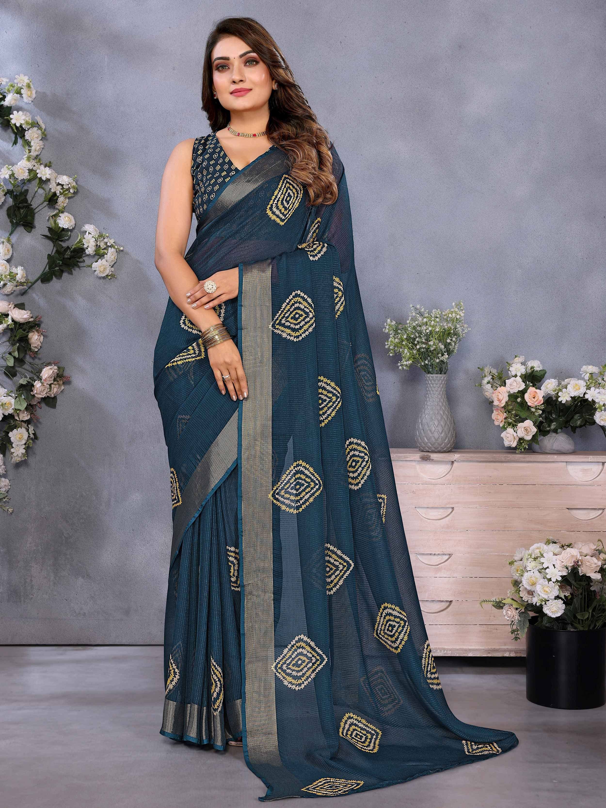 Teal saree with gold geometric embroidery, perfect for Indian ethnic wear and festive occasions.