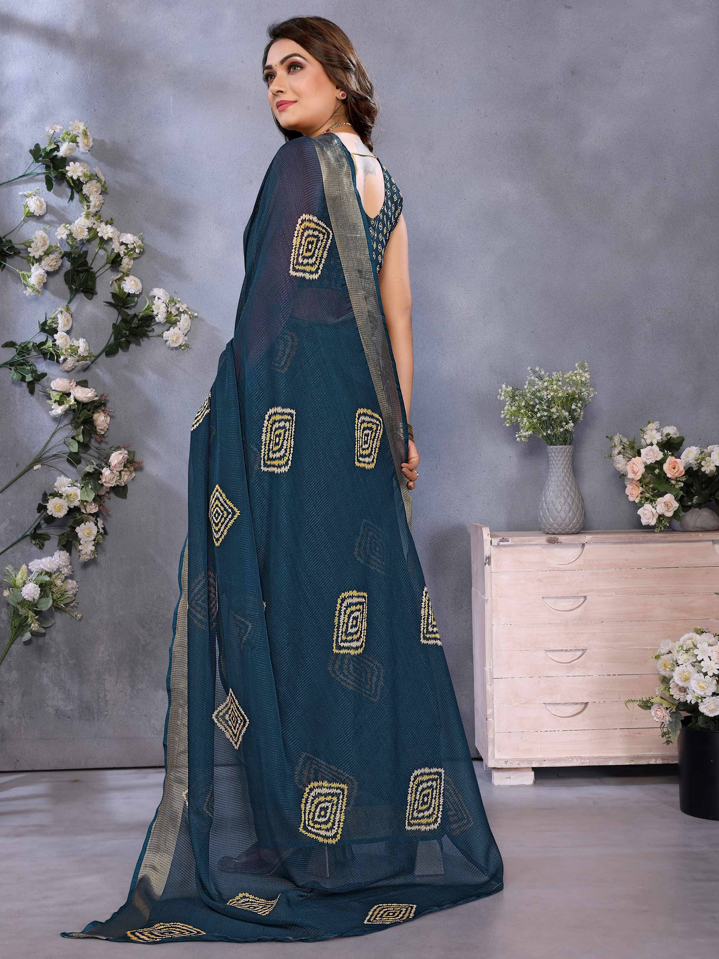 Teal saree with gold geometric embroidery, perfect for ethnic occasions and Indian wear