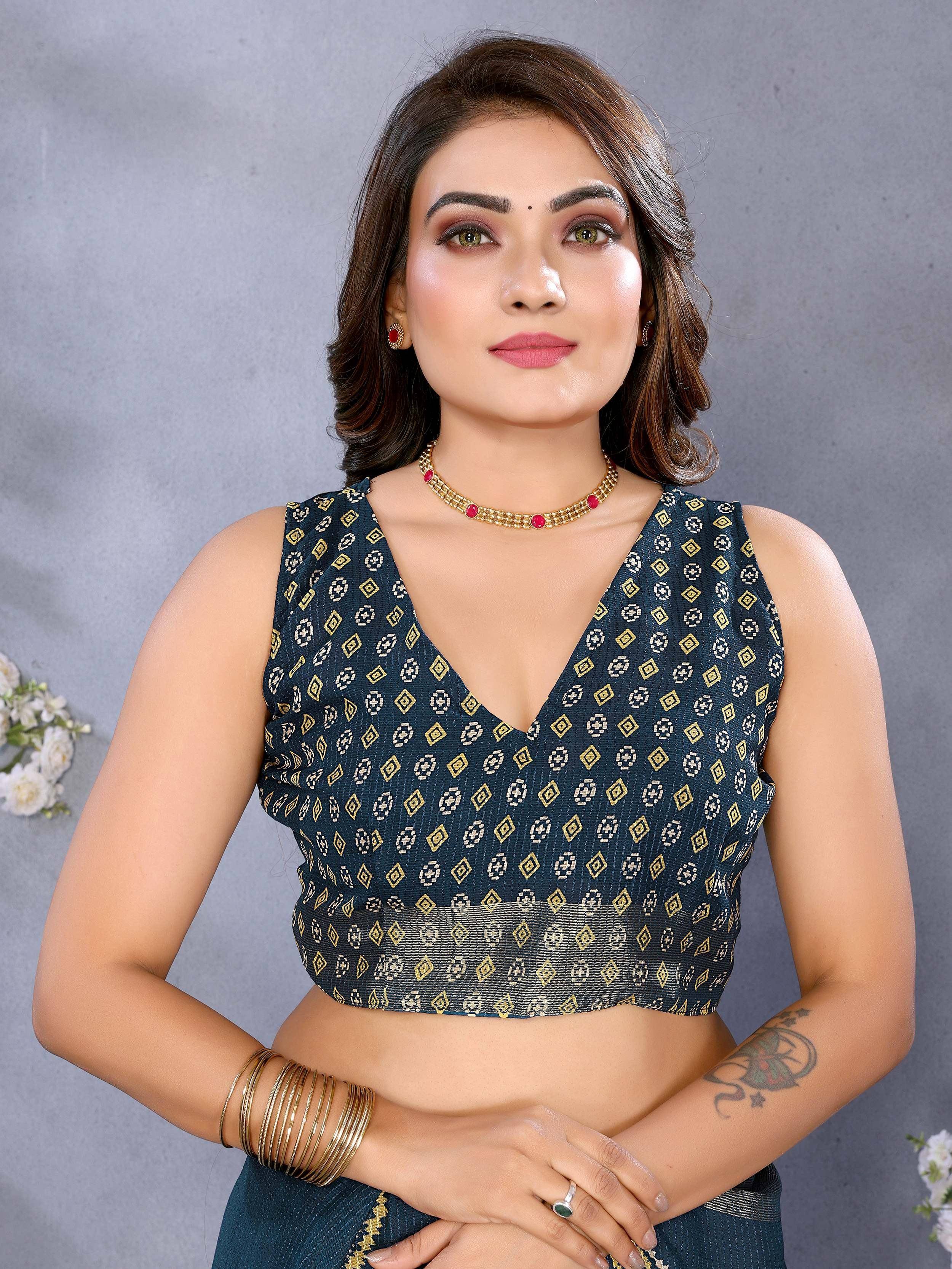 Elegant ethnic blouse with geometric print, paired with traditional jewelry for festive occasions.
