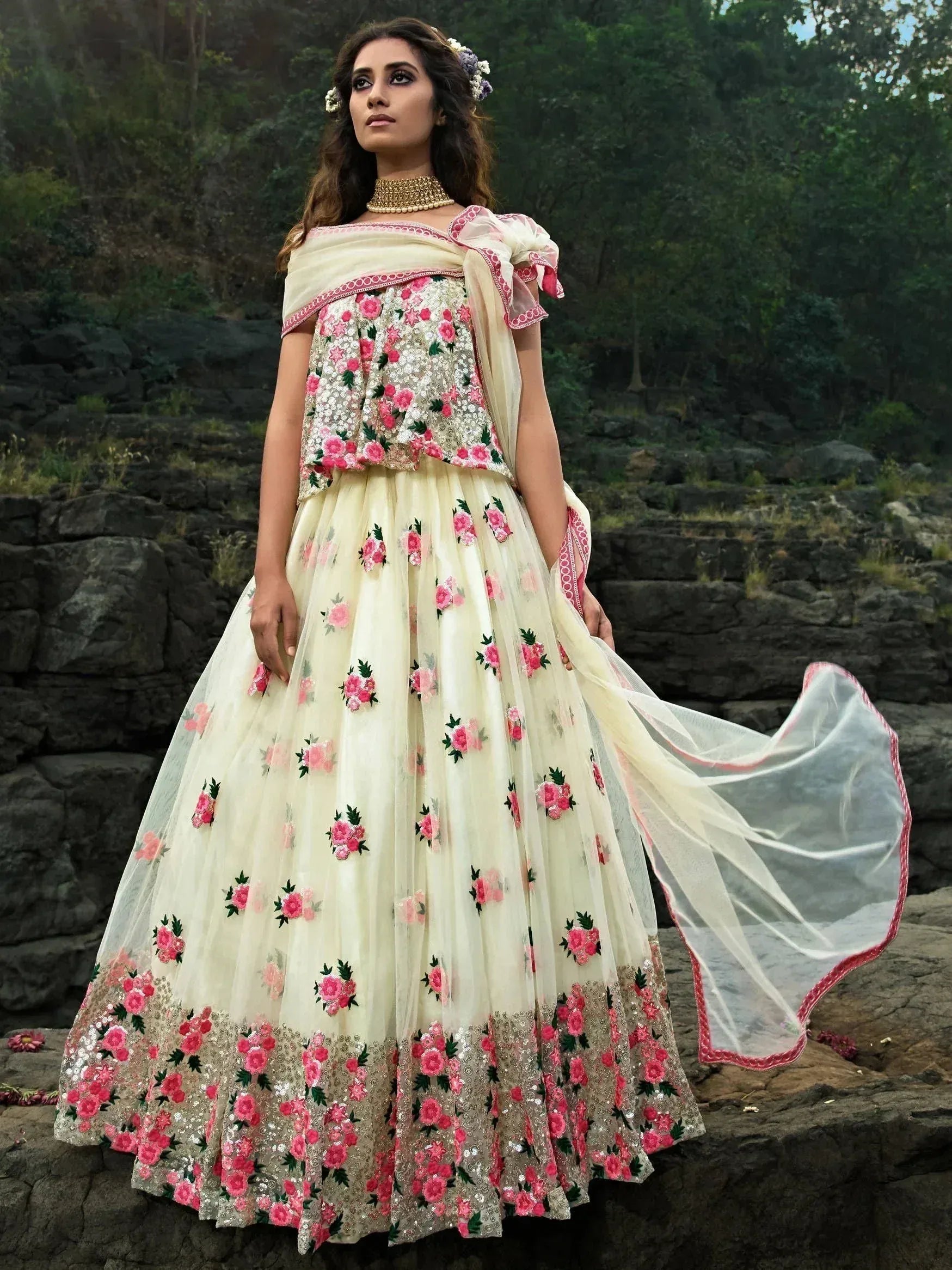 Cream floral lehenga choli with pink embroidery, perfect for Indian ethnic wear and festive occasions.