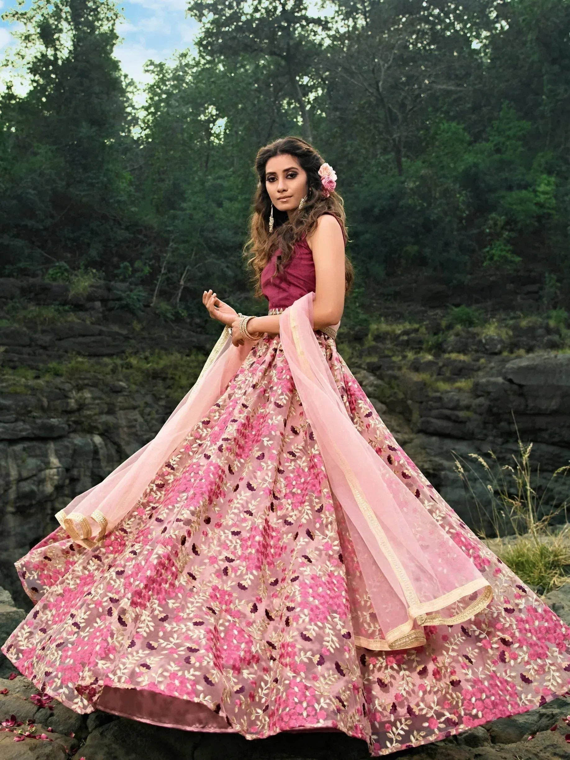 Pink floral embroidered lehenga choli with gold detailing, perfect for Indian ethnic wear occasions