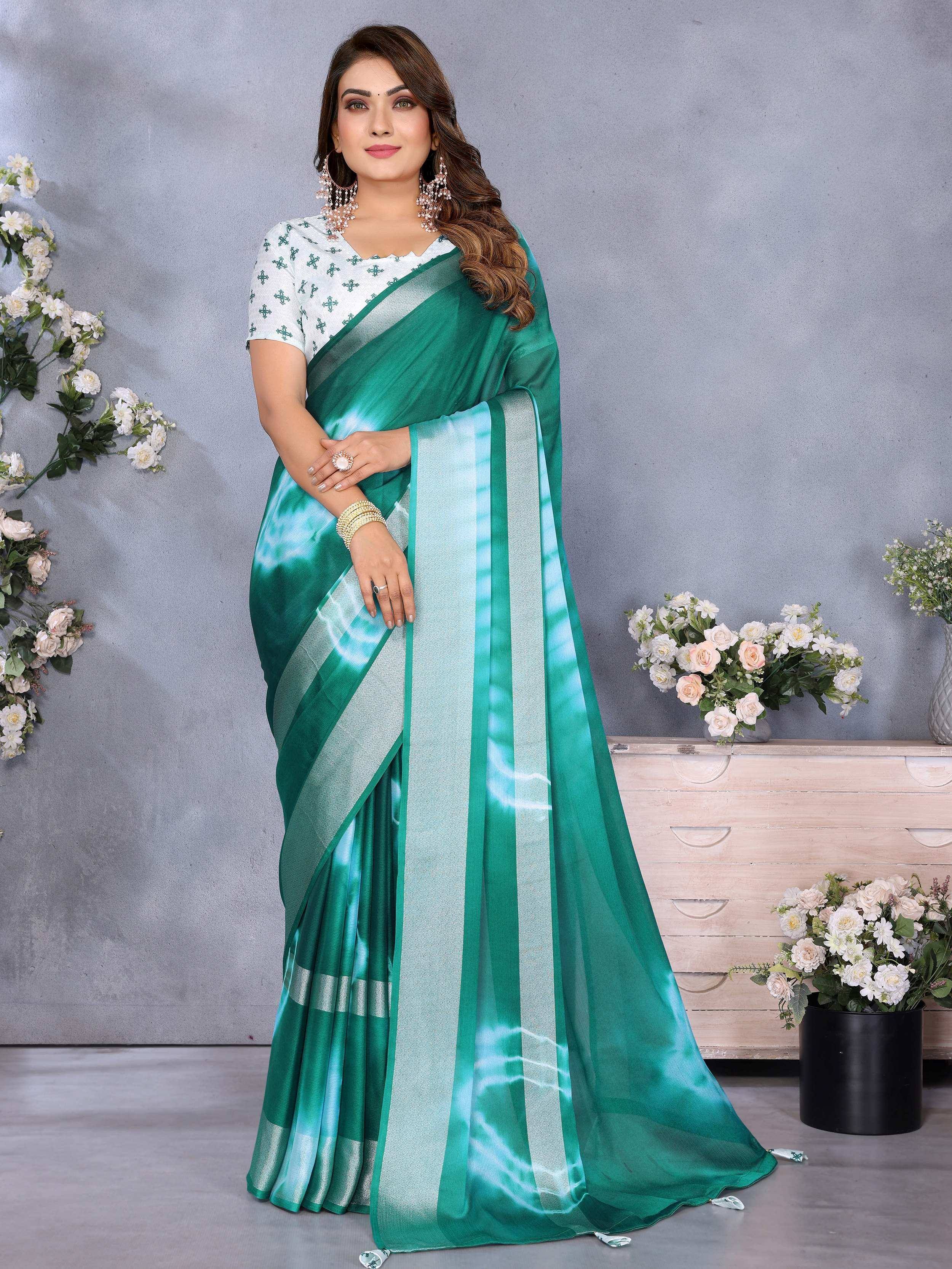 Elegant green saree with silver stripes and floral blouse, perfect for Indian ethnic wear occasions.