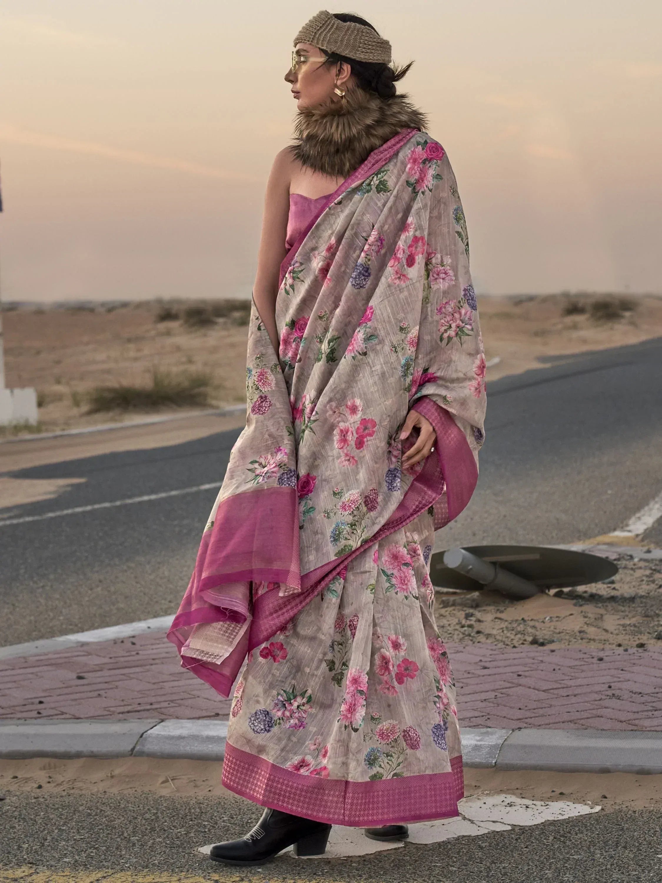 Woman in floral print saree with pink border, ethnic wear for women, desert road backdrop