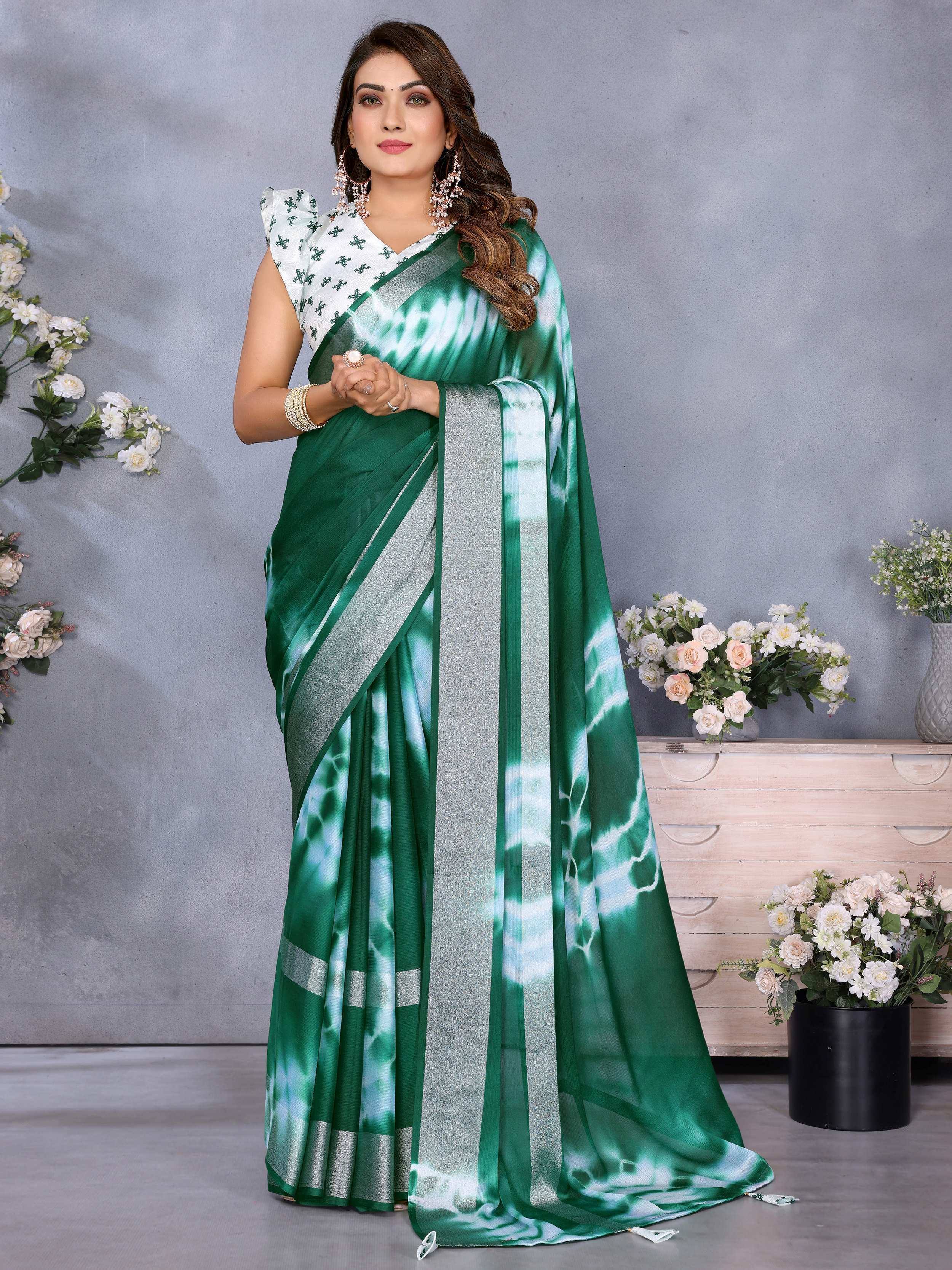Green tie-dye saree with silver border and printed blouse, ethnic Indian wear