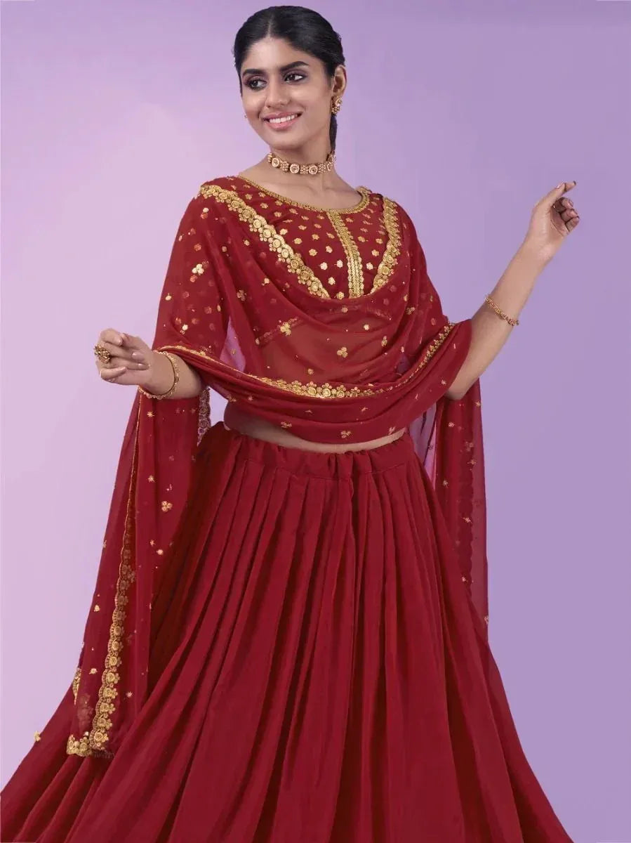 Red designer lehenga choli with gold embroidery, perfect for Indian ethnic wear occasions