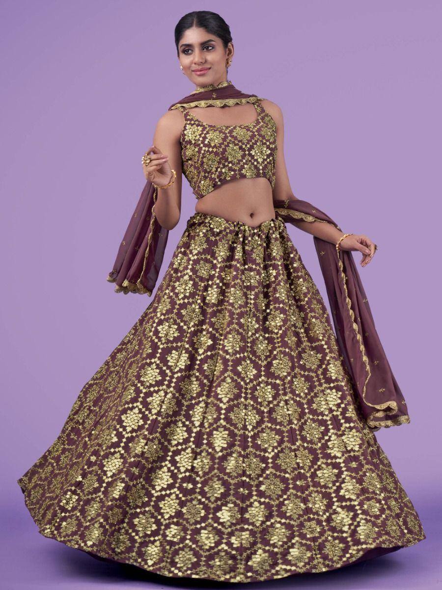 Maroon and gold embroidered lehenga choli with matching dupatta, perfect for Indian ethnic occasions