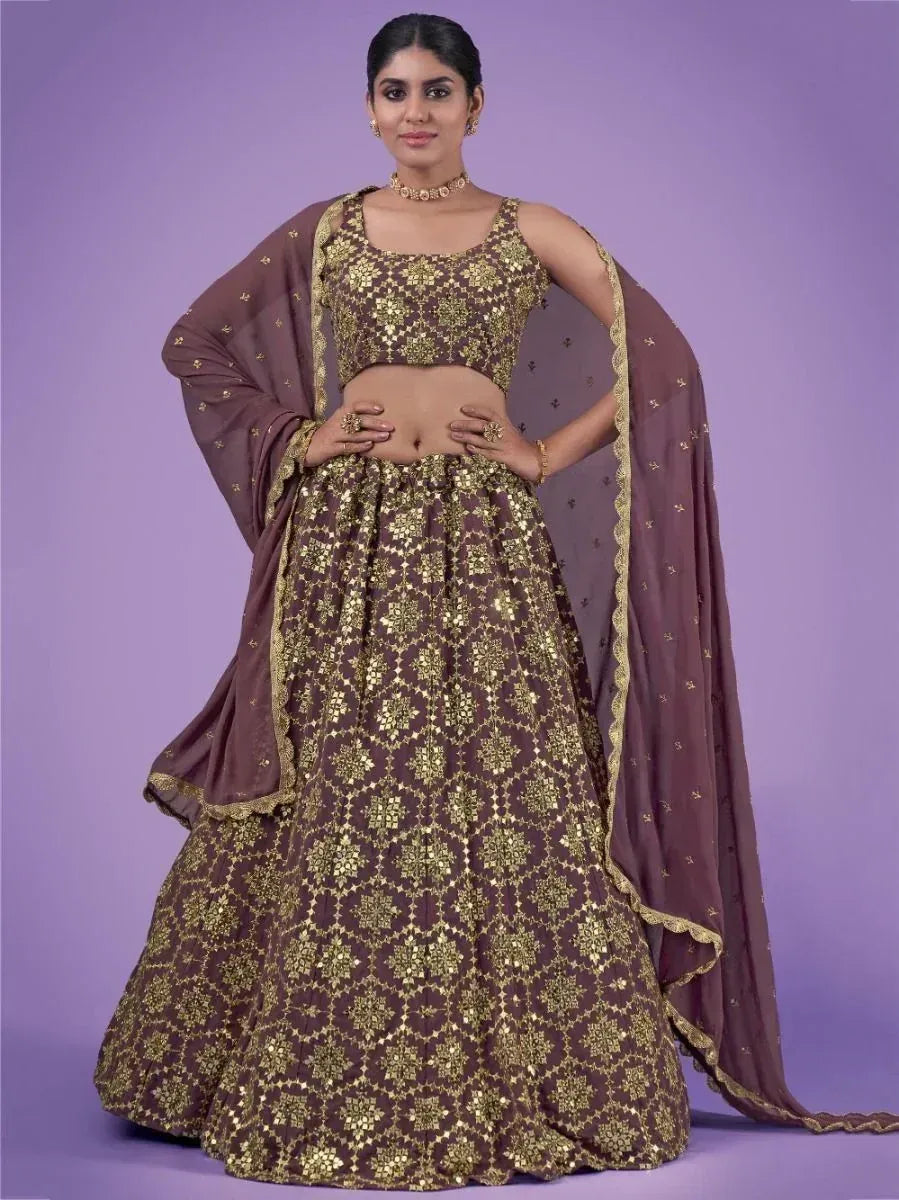 Brown and gold embroidered lehenga choli with matching dupatta, perfect for Indian ethnic occasions