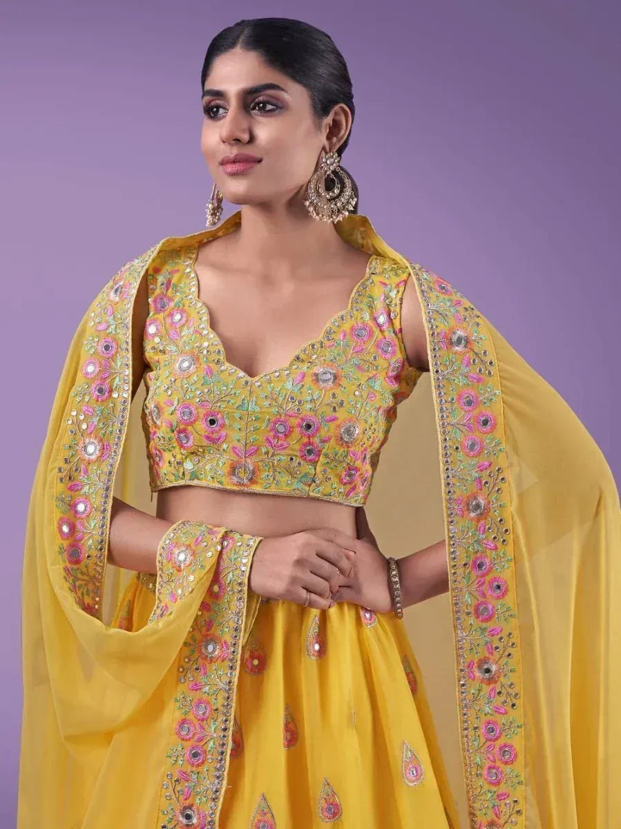 Yellow floral embroidered lehenga choli with matching dupatta, perfect for Indian ethnic occasions