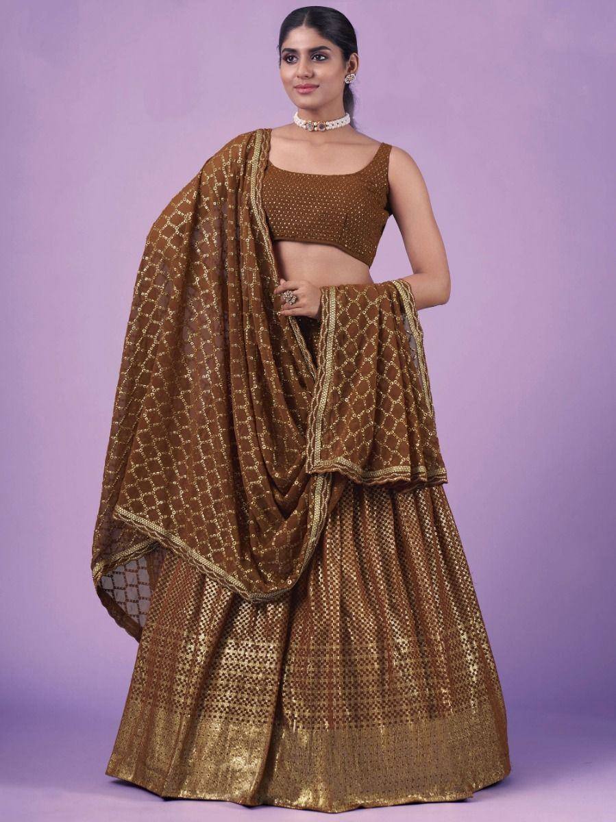 Brown and gold embroidered lehenga choli with dupatta, perfect for Indian ethnic occasions