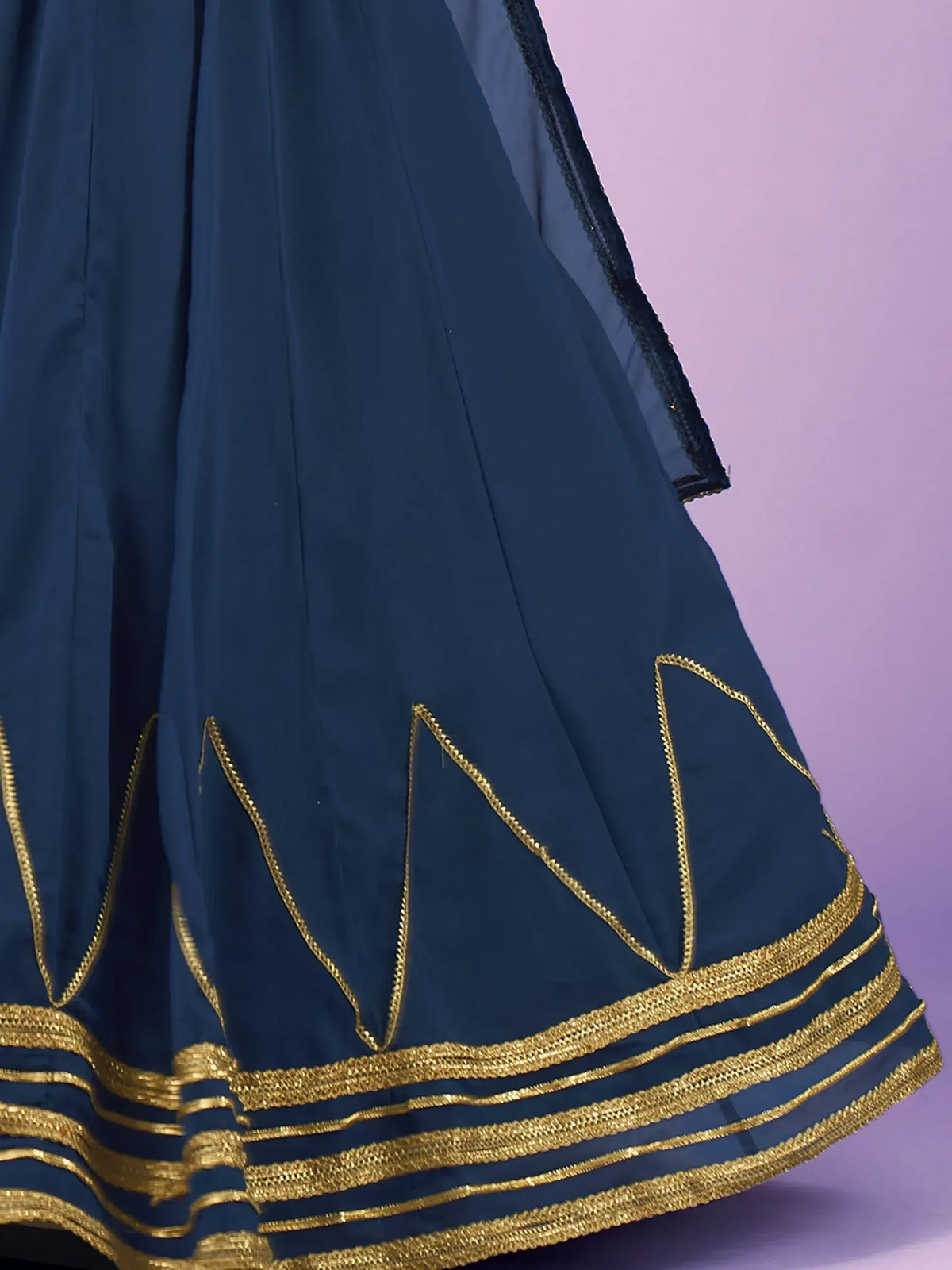 Navy blue ethnic gown with golden embroidery and layered hem design