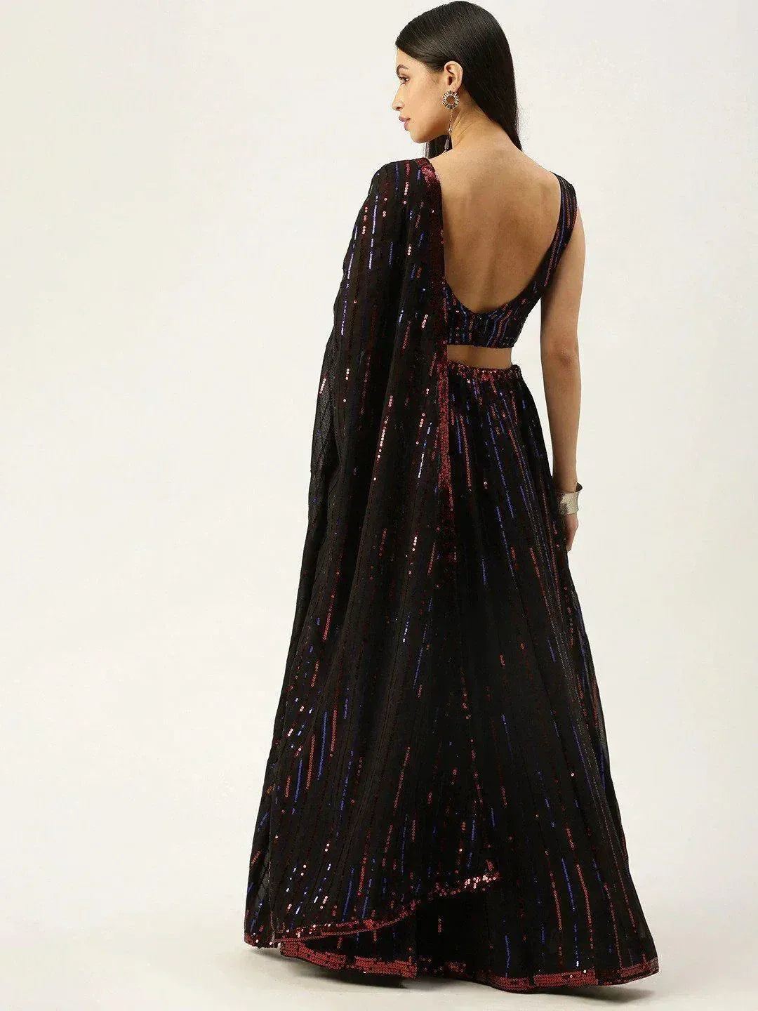 Black sequin lehenga choli with open back design, perfect for ethnic occasions