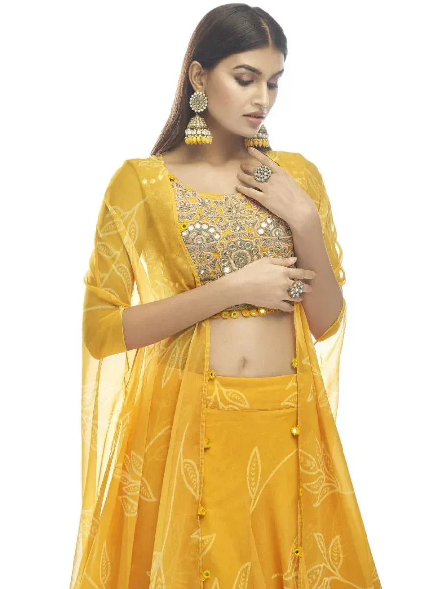 Yellow embroidered lehenga choli with floral dupatta, perfect for Indian ethnic occasions
