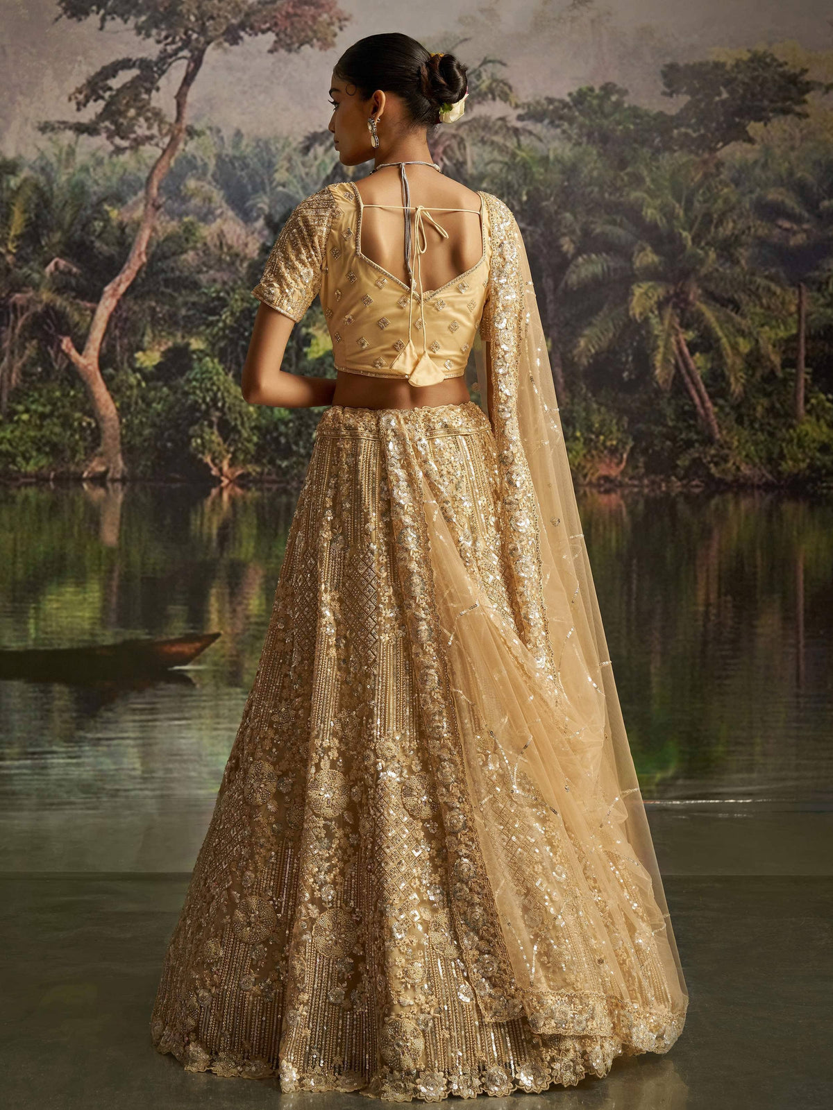 Golden embroidered lehenga choli with back tie blouse and sheer dupatta, Indian ethnic wear