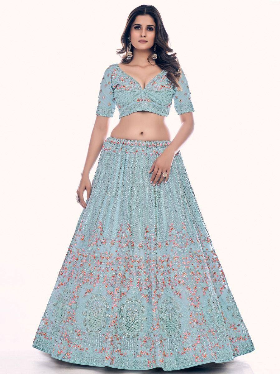 Light blue embroidered lehenga choli with floral motifs, perfect for Indian ethnic wear and festive occasions.