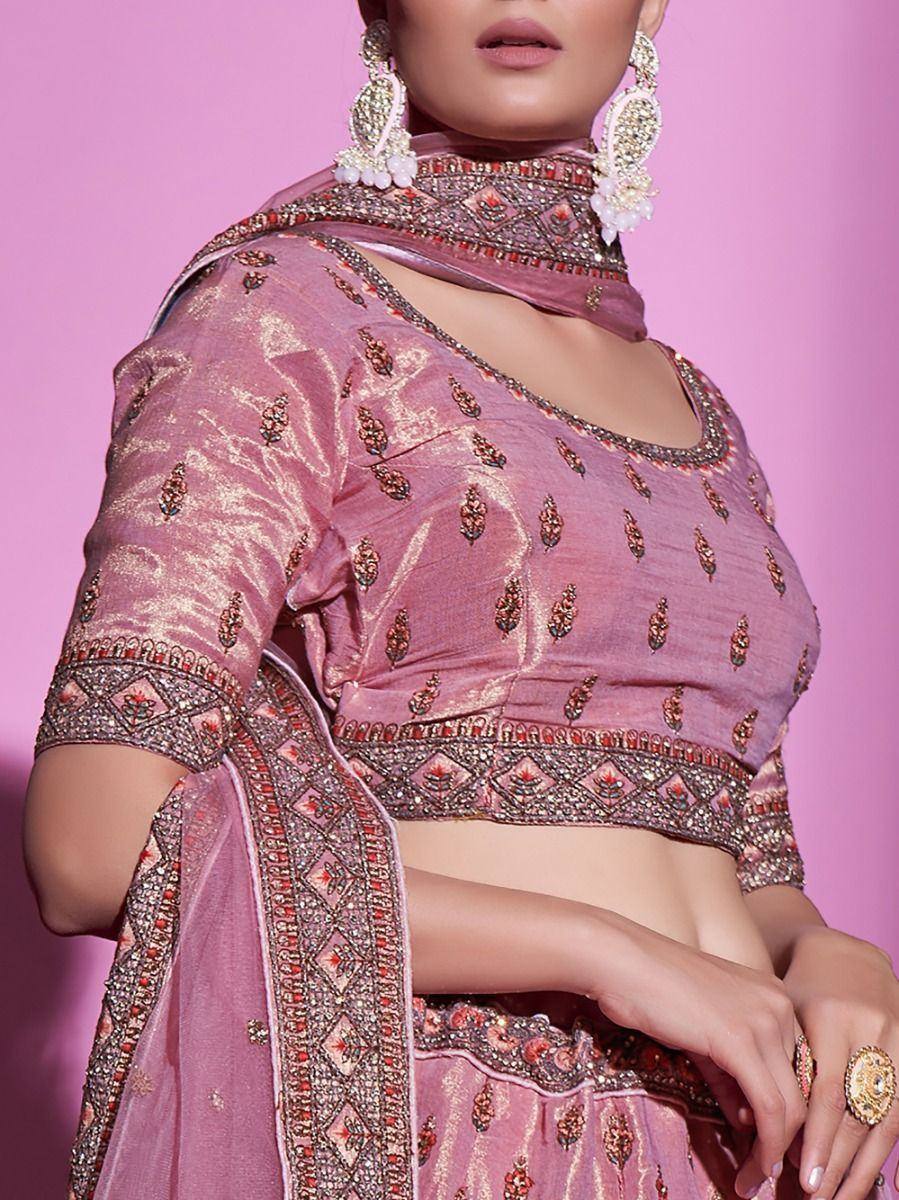 Pink embroidered lehenga choli with heavy embellishments and matching dupatta, ideal for Indian ethnic wear occasions