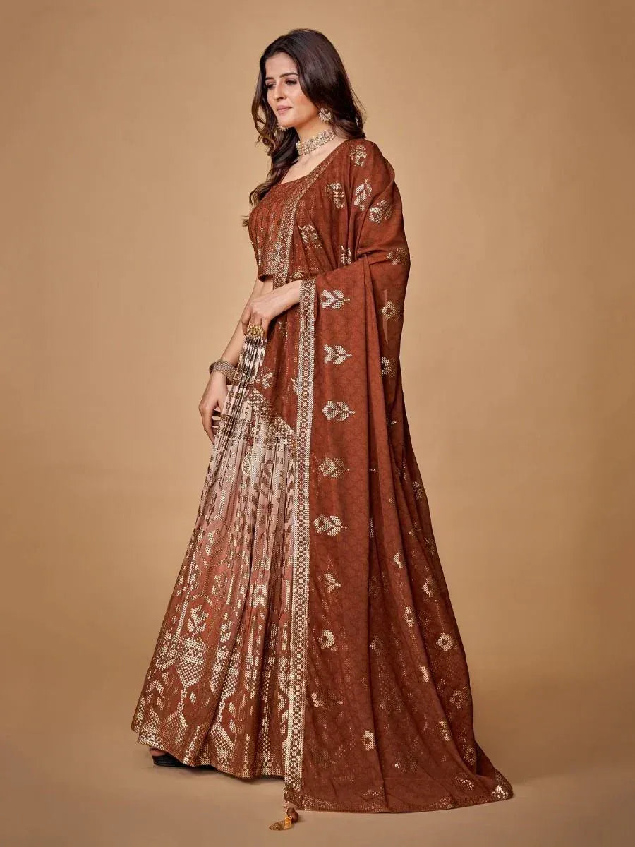 Brown embroidered lehenga choli with gold detailing, perfect for Indian ethnic wear occasions