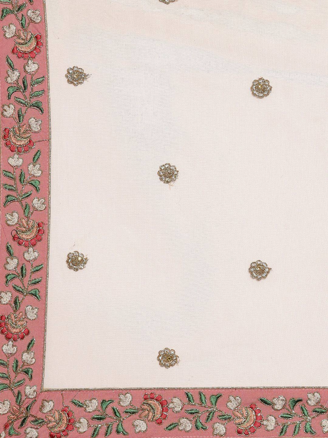 Cream ethnic fabric with pink floral border and gold floral embroidery, ideal for designer lehenga or saree