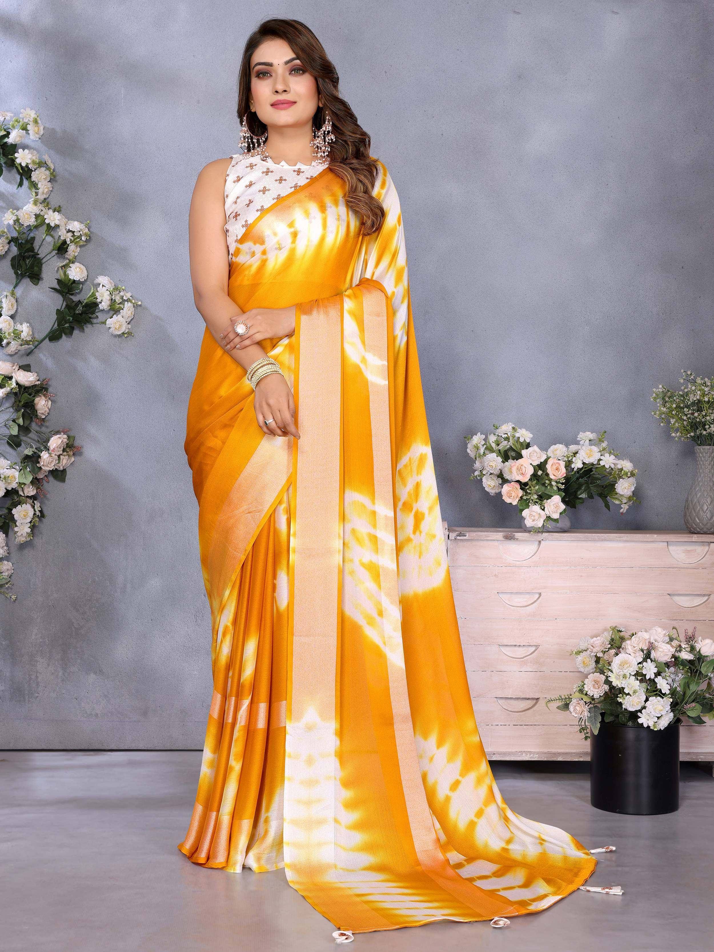 Yellow and white tie-dye saree with embroidered blouse, styled for Indian ethnic wear