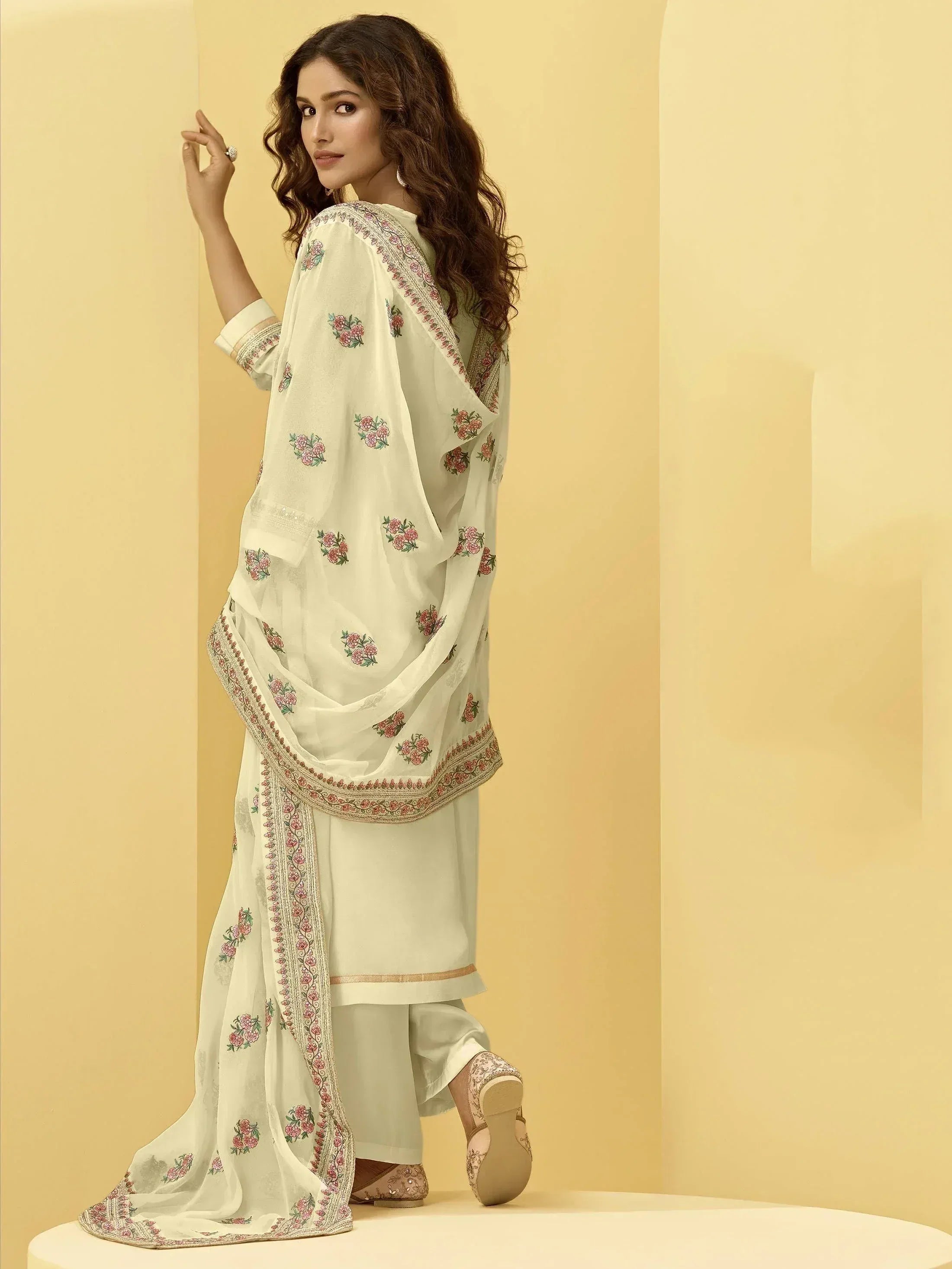 Elegant cream salwar kameez with floral embroidery and dupatta, perfect for Indian ethnic wear