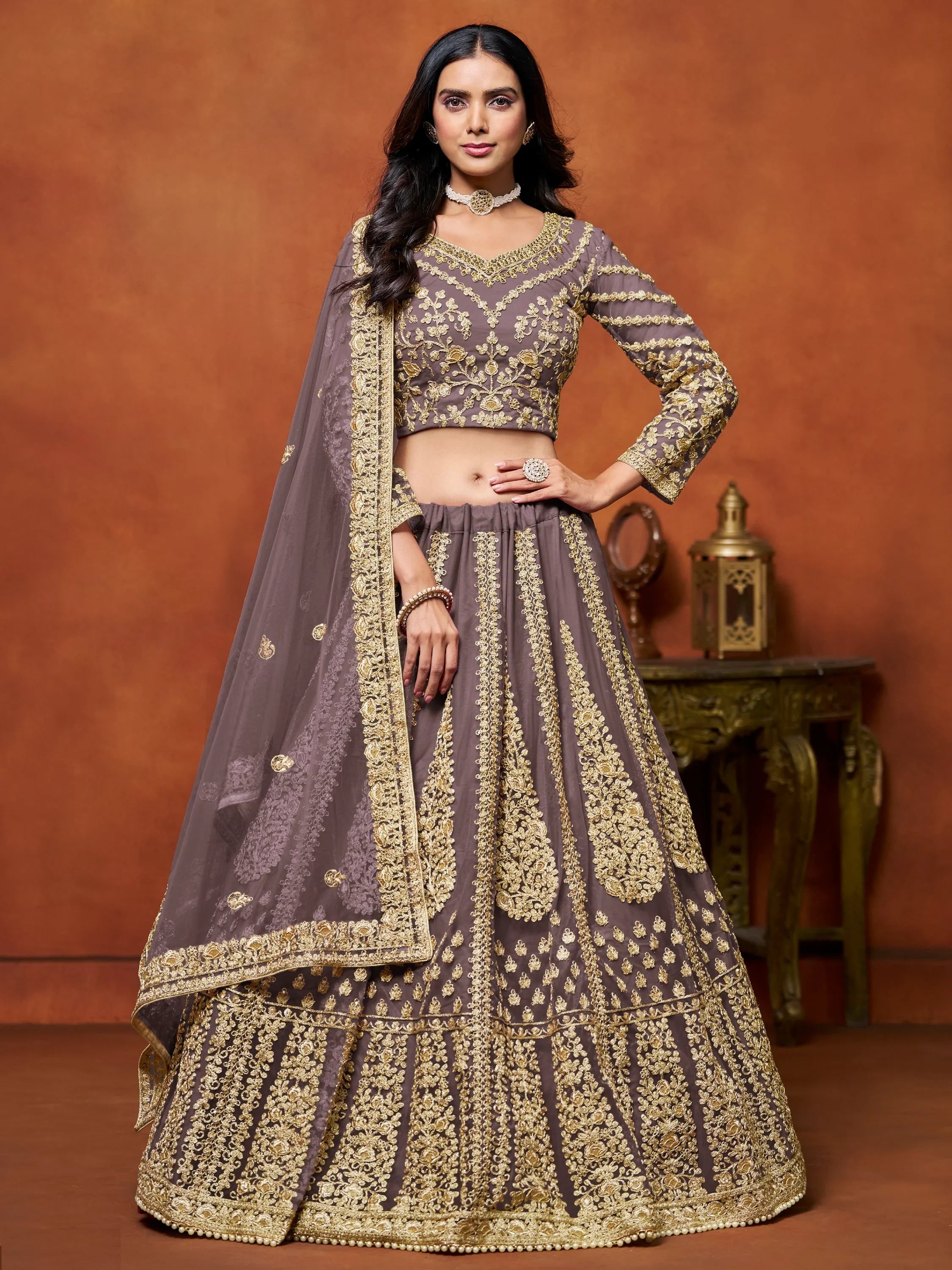 Beautiful Dusty Brown Zari Work Net Reception Wear Lehenga Choli
