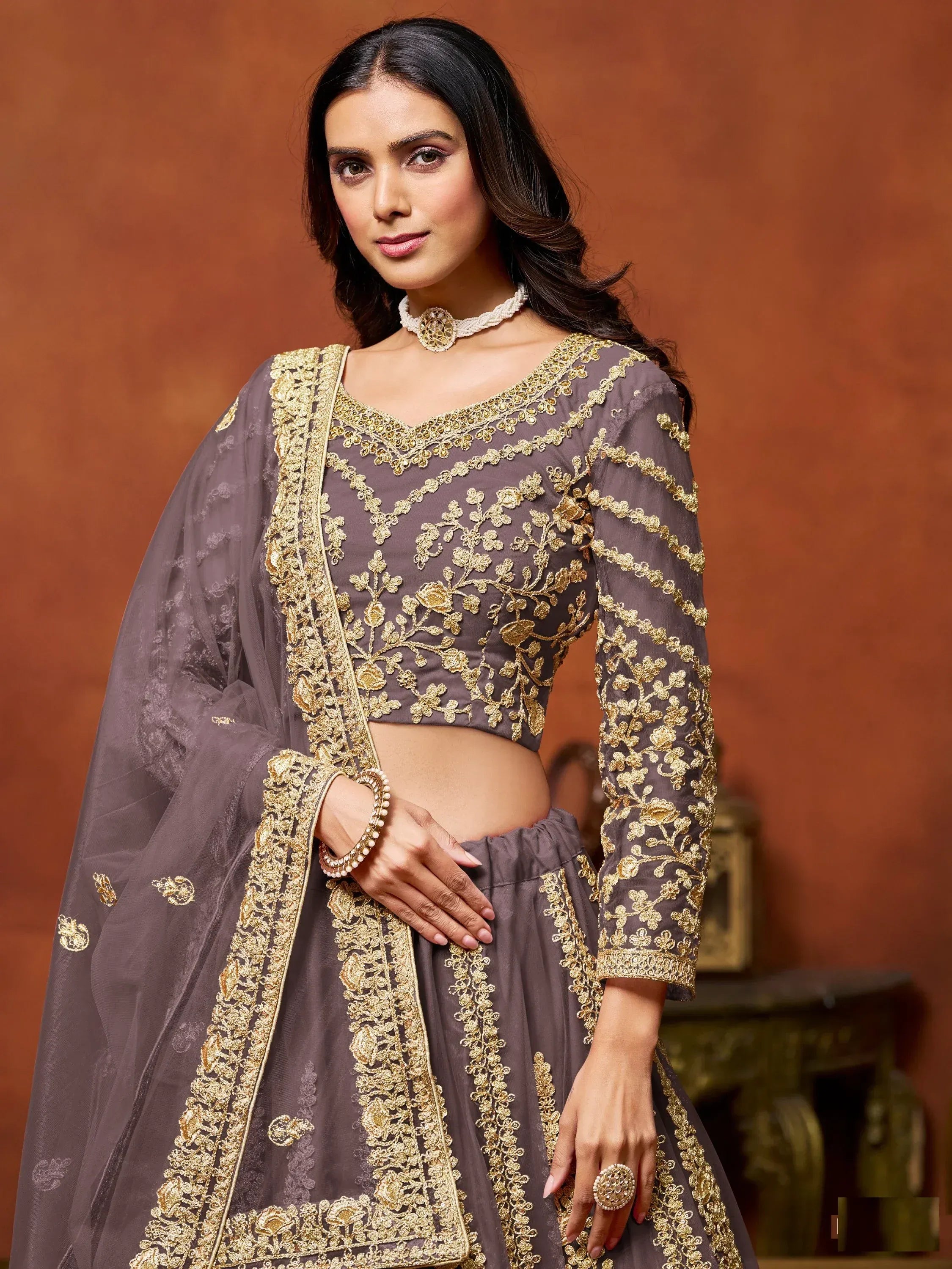 Beautiful Lavender Zari Work Net Reception Wear Lehenga Choli