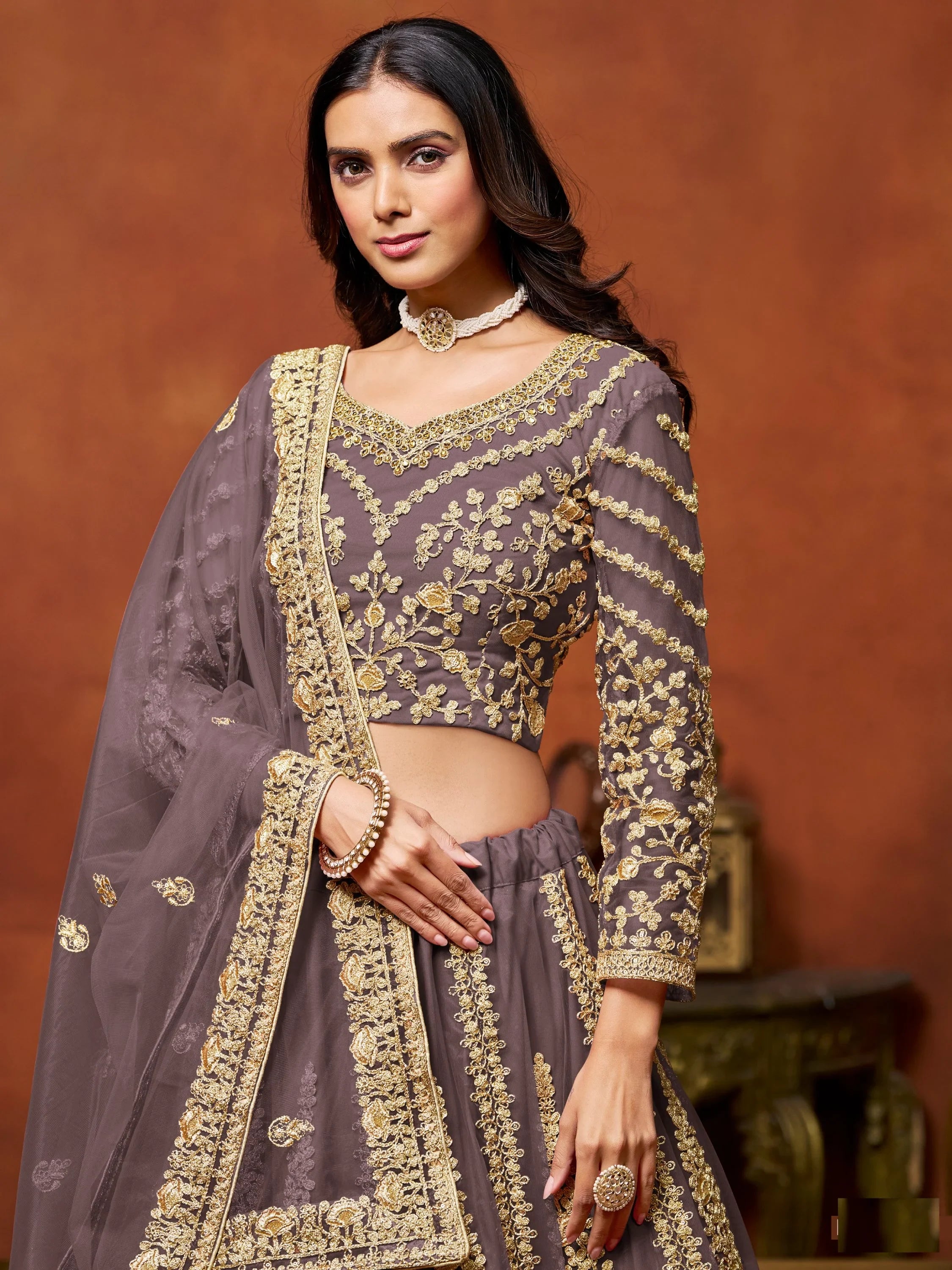 Beautiful Dusty Brown Zari Work Net Reception Wear Lehenga Choli