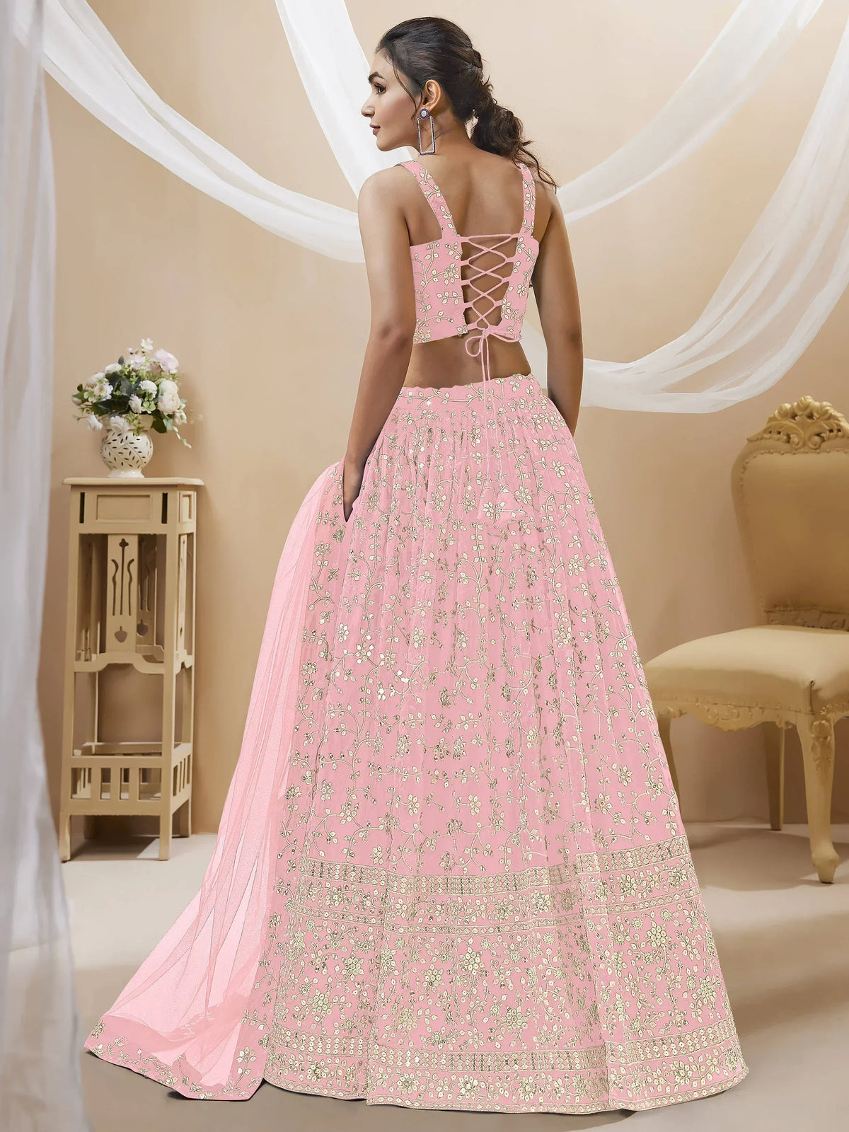 Pink floral embroidered lehenga choli with lace-up back design