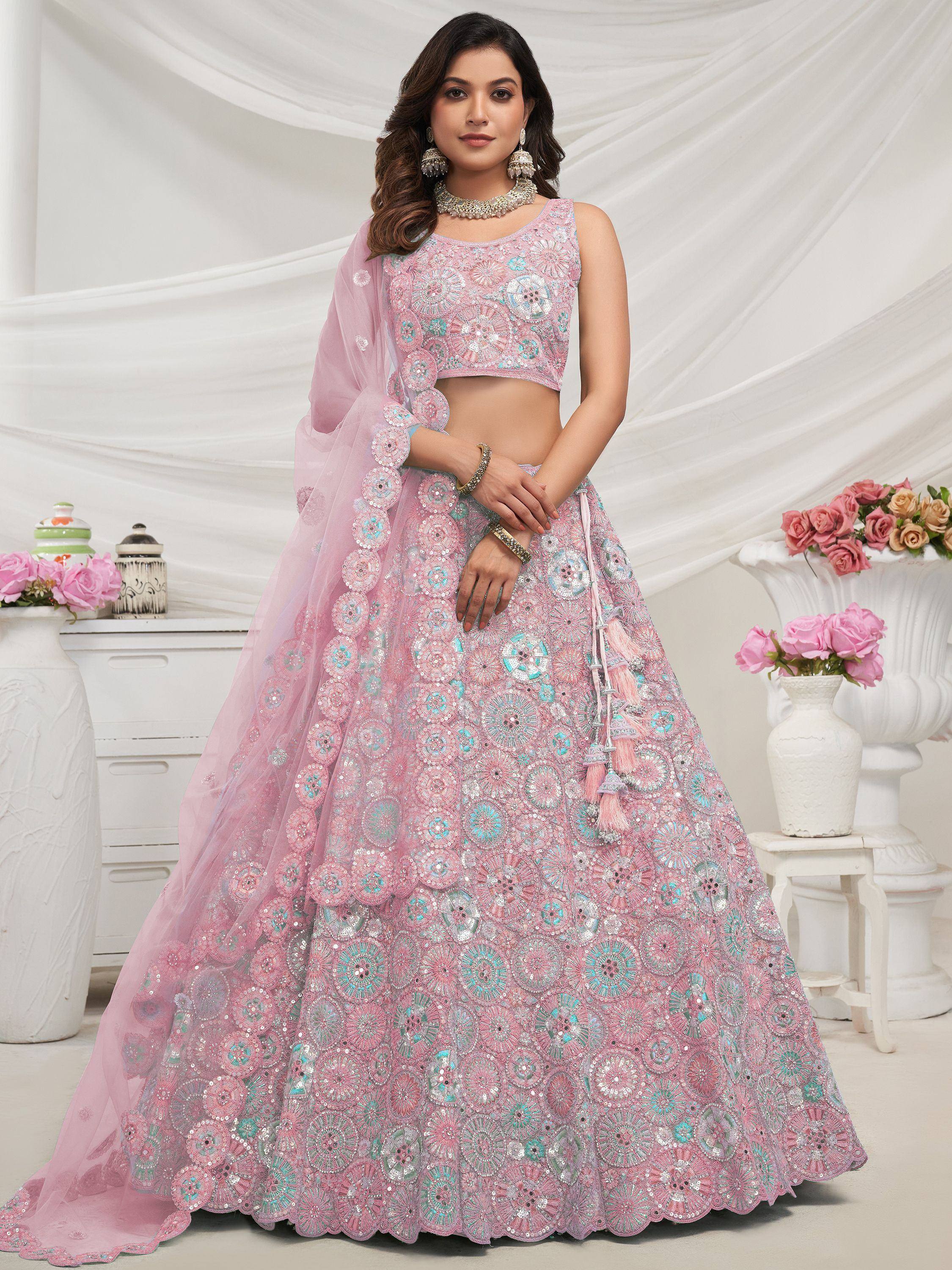 Pink floral embroidered lehenga choli with net dupatta, perfect for weddings and festive occasions