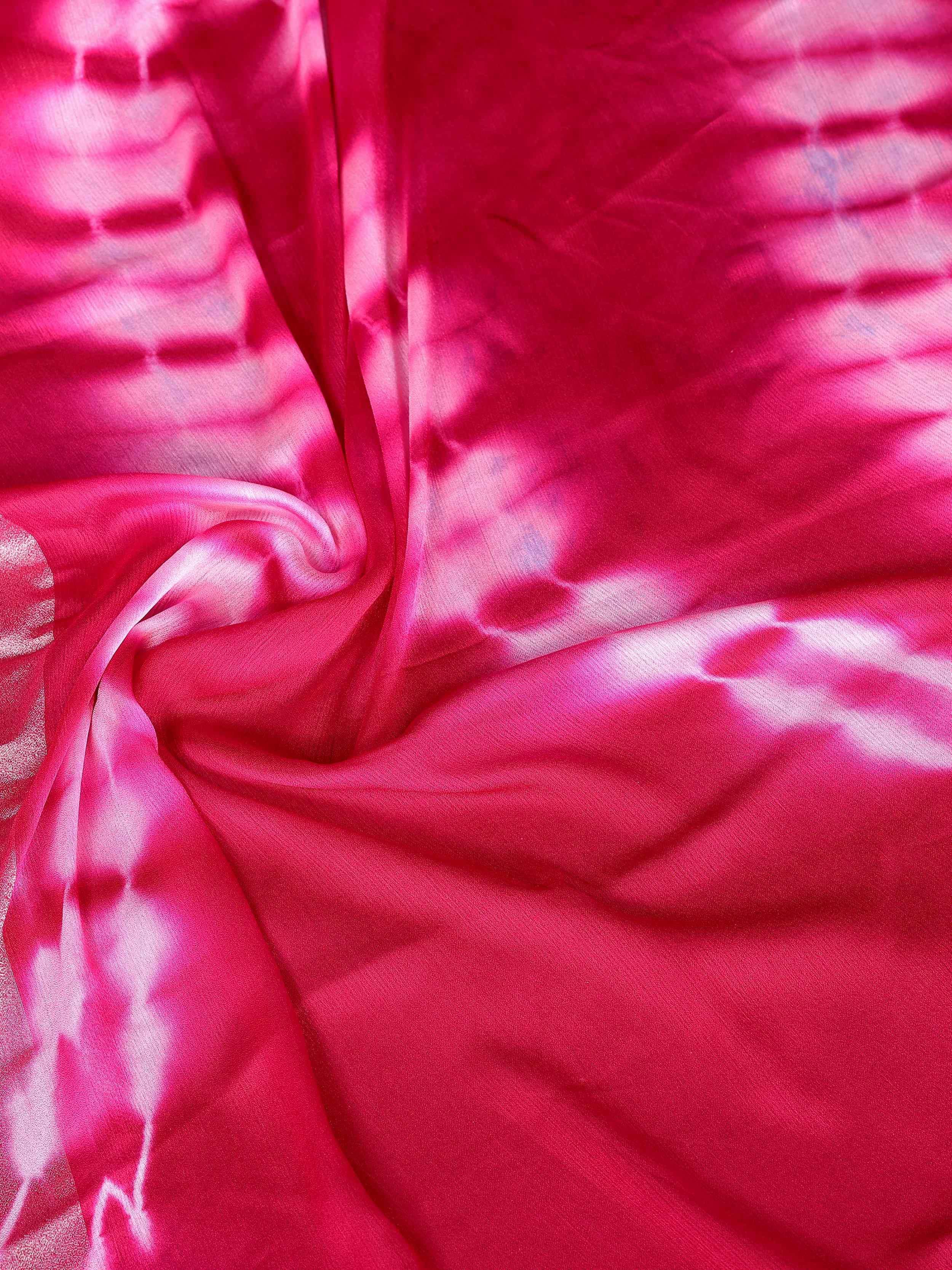 Vibrant pink tie-dye fabric for ethnic wear, perfect for designer lehenga choli or sarees.