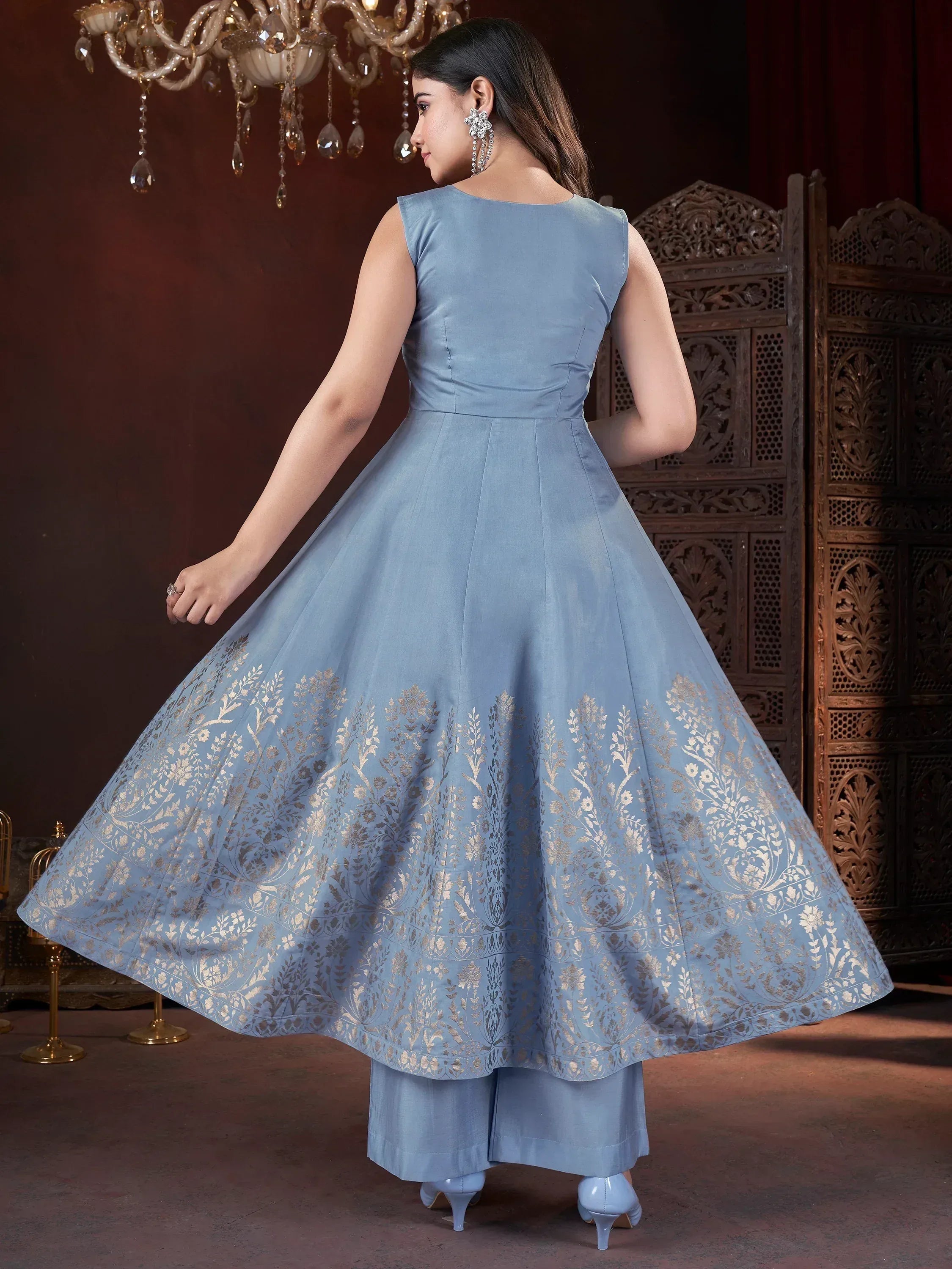 Light blue ethnic gown with gold floral embroidery, paired with matching palazzo pants for festive occasions