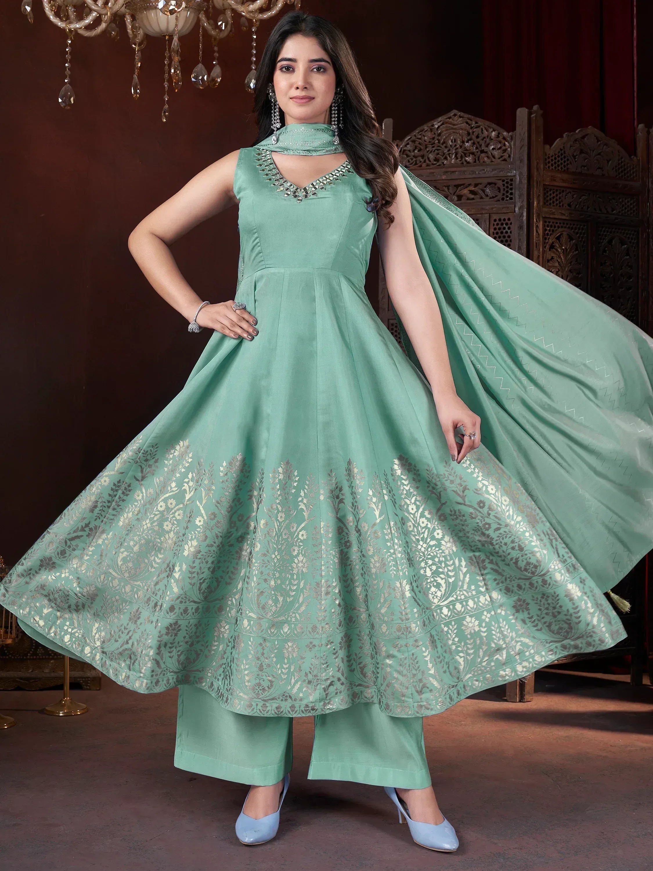 Mint green designer anarkali suit with floral embroidery, matching dupatta, and palazzo pants for ethnic occasions