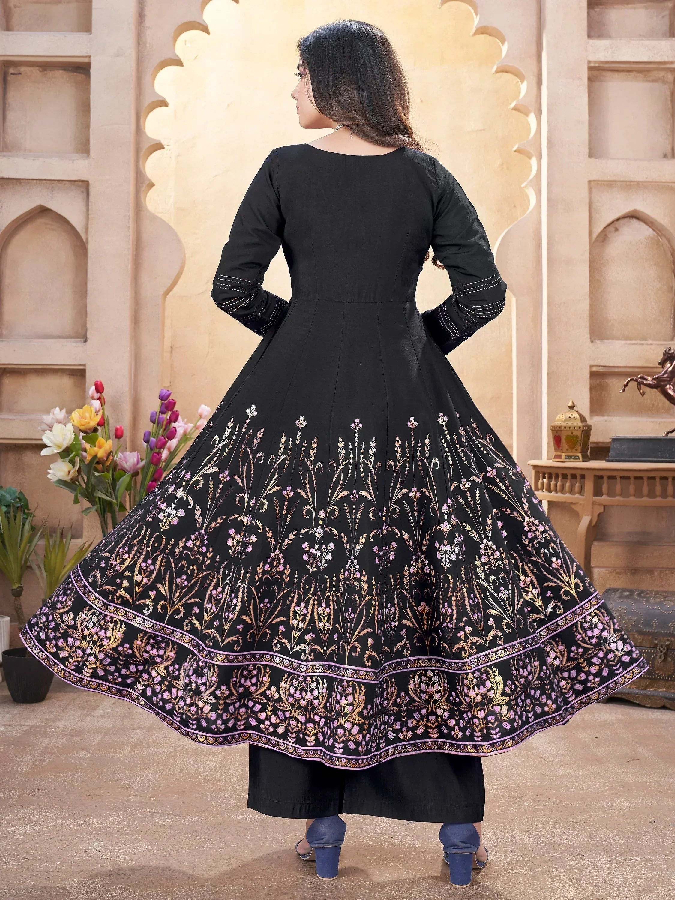 Black ethnic gown with floral embroidery, perfect for Indian occasions and festive wear.