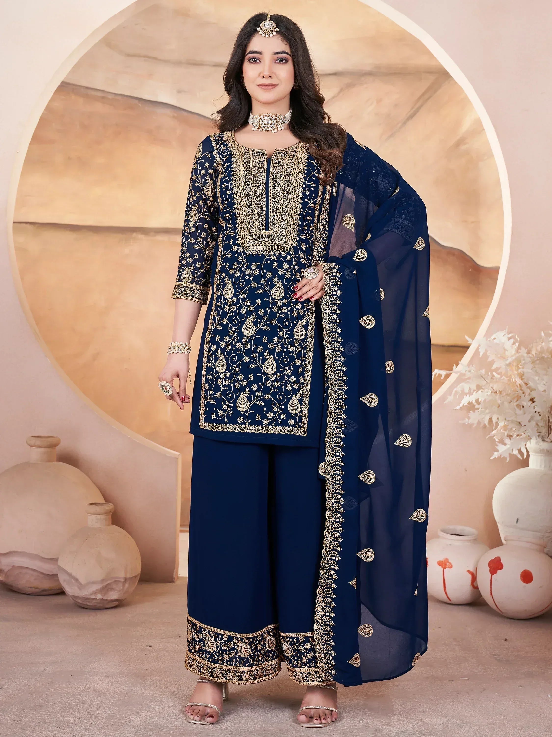 Navy blue embroidered salwar kameez with gold work, palazzo pants, and dupatta for Indian ethnic wear