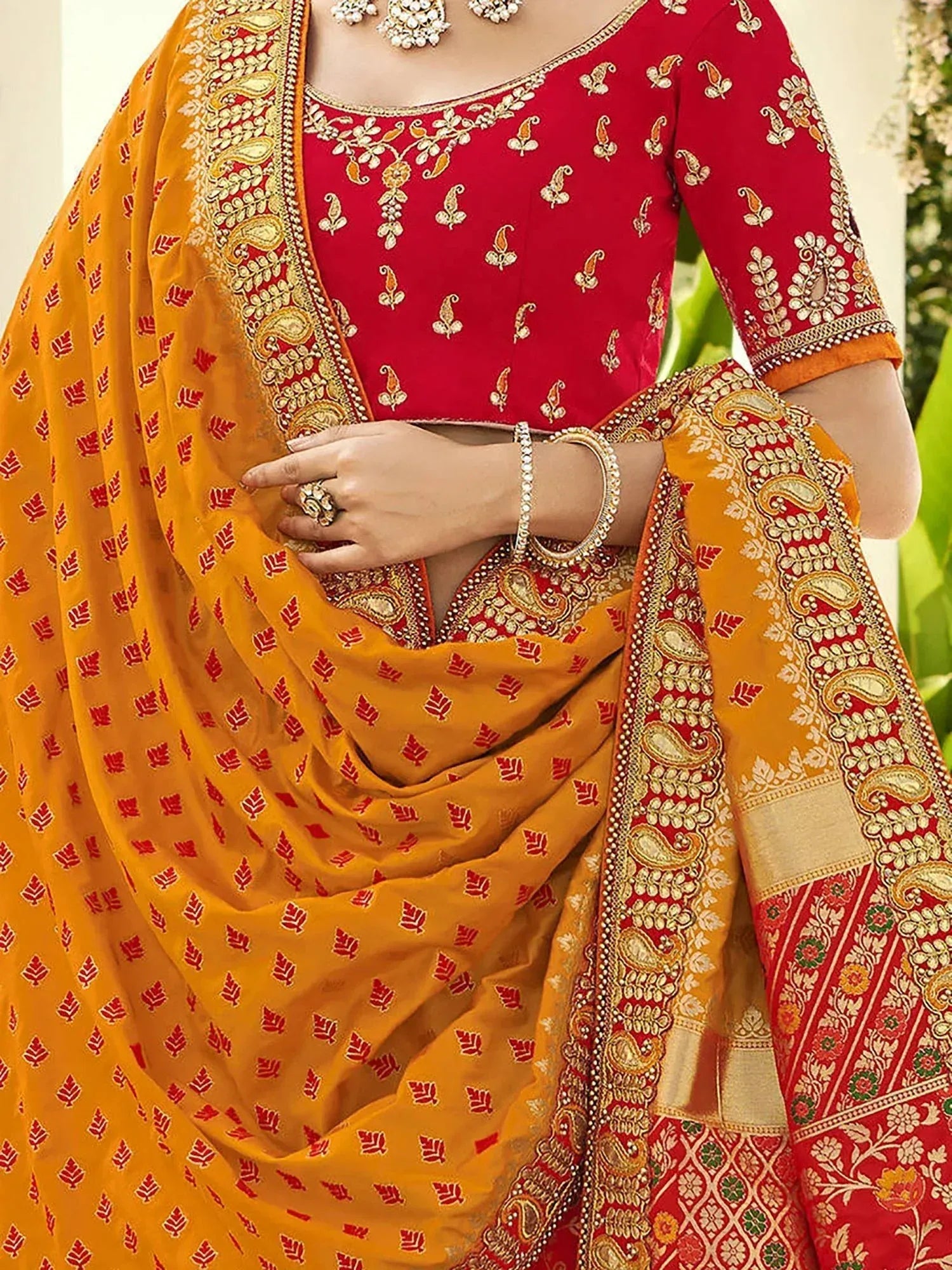 Red and mustard yellow embroidered saree with paisley border, perfect for Indian ethnic wear occasions